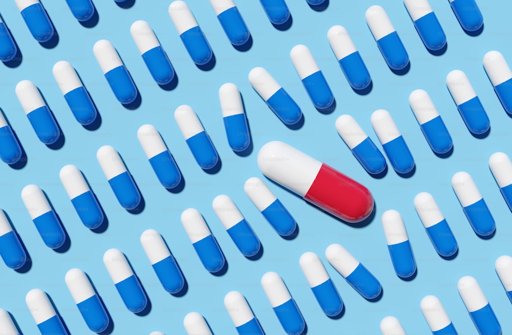 Una grande capsula di pillole rosse che interrompe file di pillole blu. Concetto di rendering 3D.