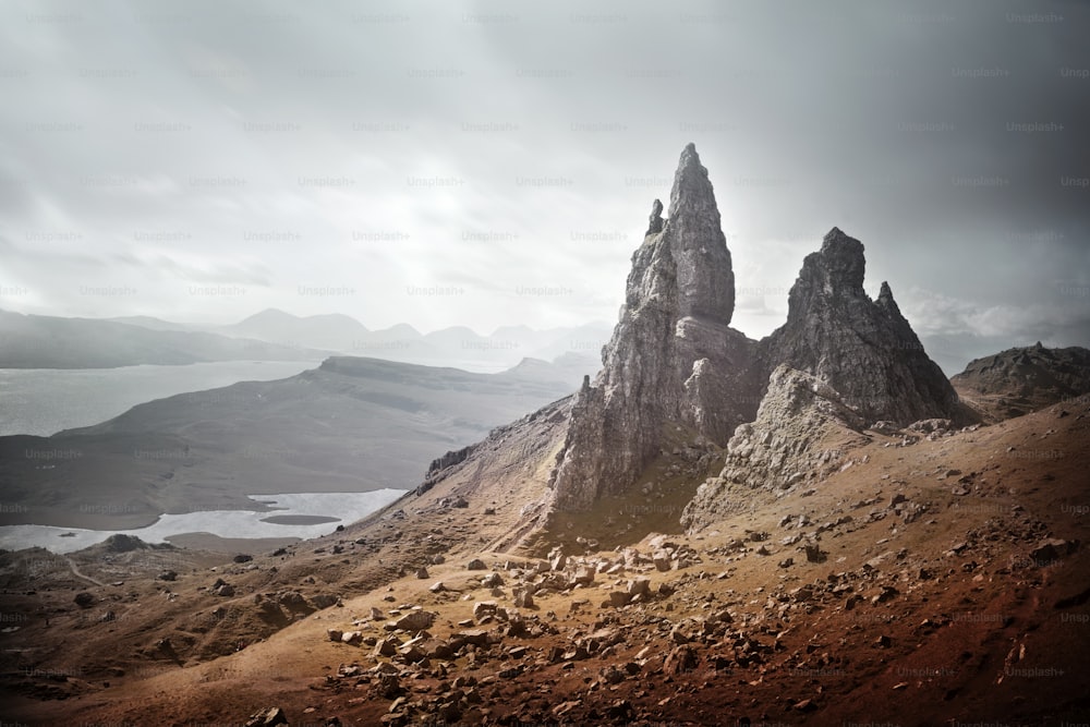 The Isle of Skye in Scotland has some dramatic and beautiful rugged wilderness landscapes attracting tourists from across the globe. This is The Storr rock formation.