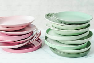 a stack of plates sitting on top of a table