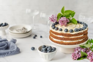 a cake sitting on top of a white table