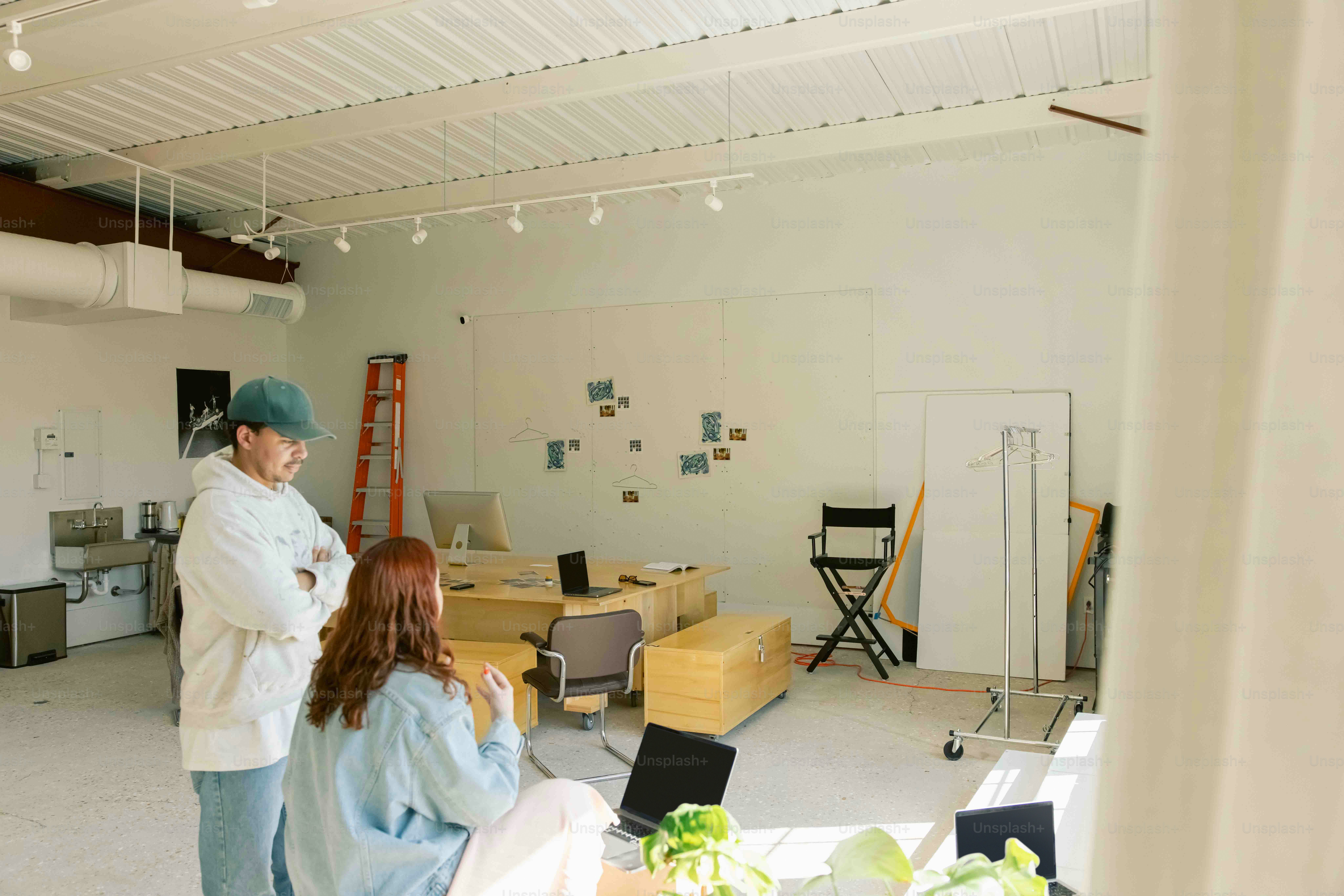 a man and a woman standing in a room