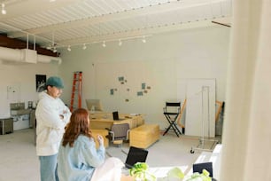 a man and a woman standing in a room