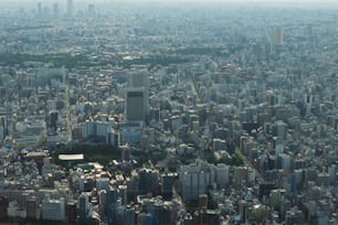 an aerial view of a city with tall buildings