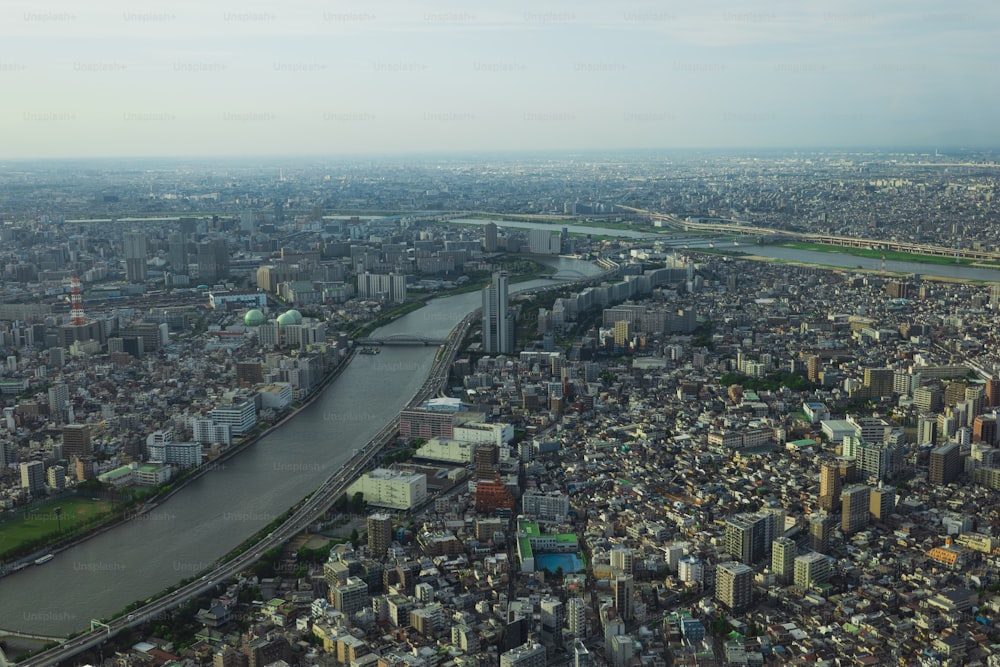 an aerial view of a city with a river running through it