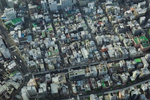 an aerial view of a city with lots of tall buildings