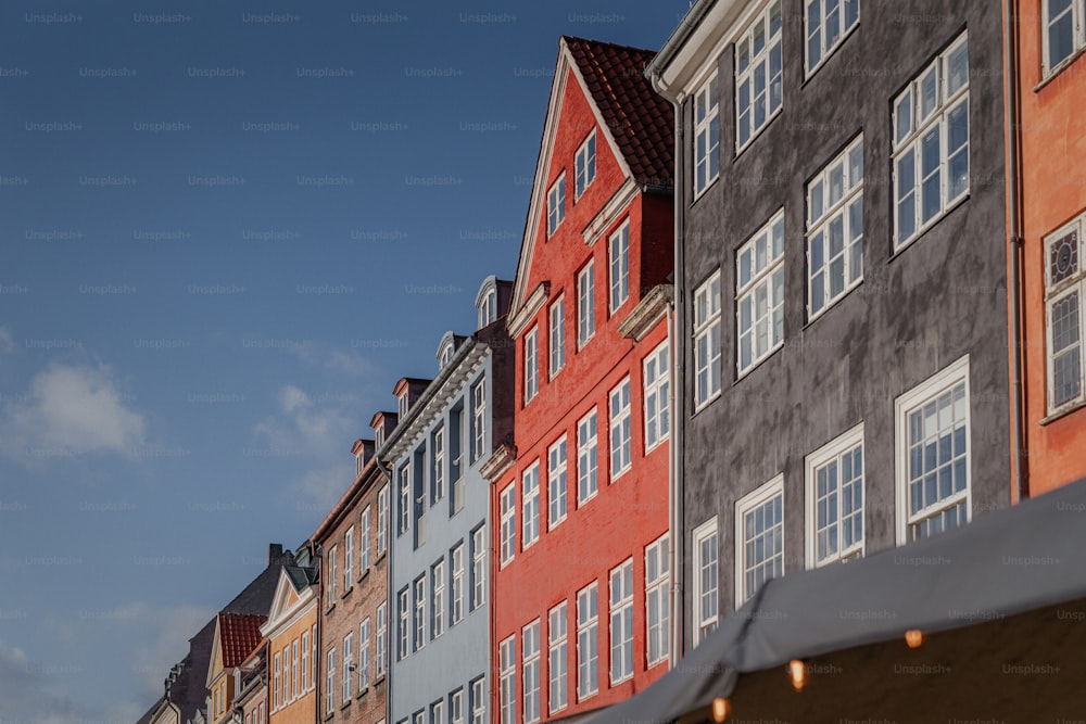 a row of buildings on a city street