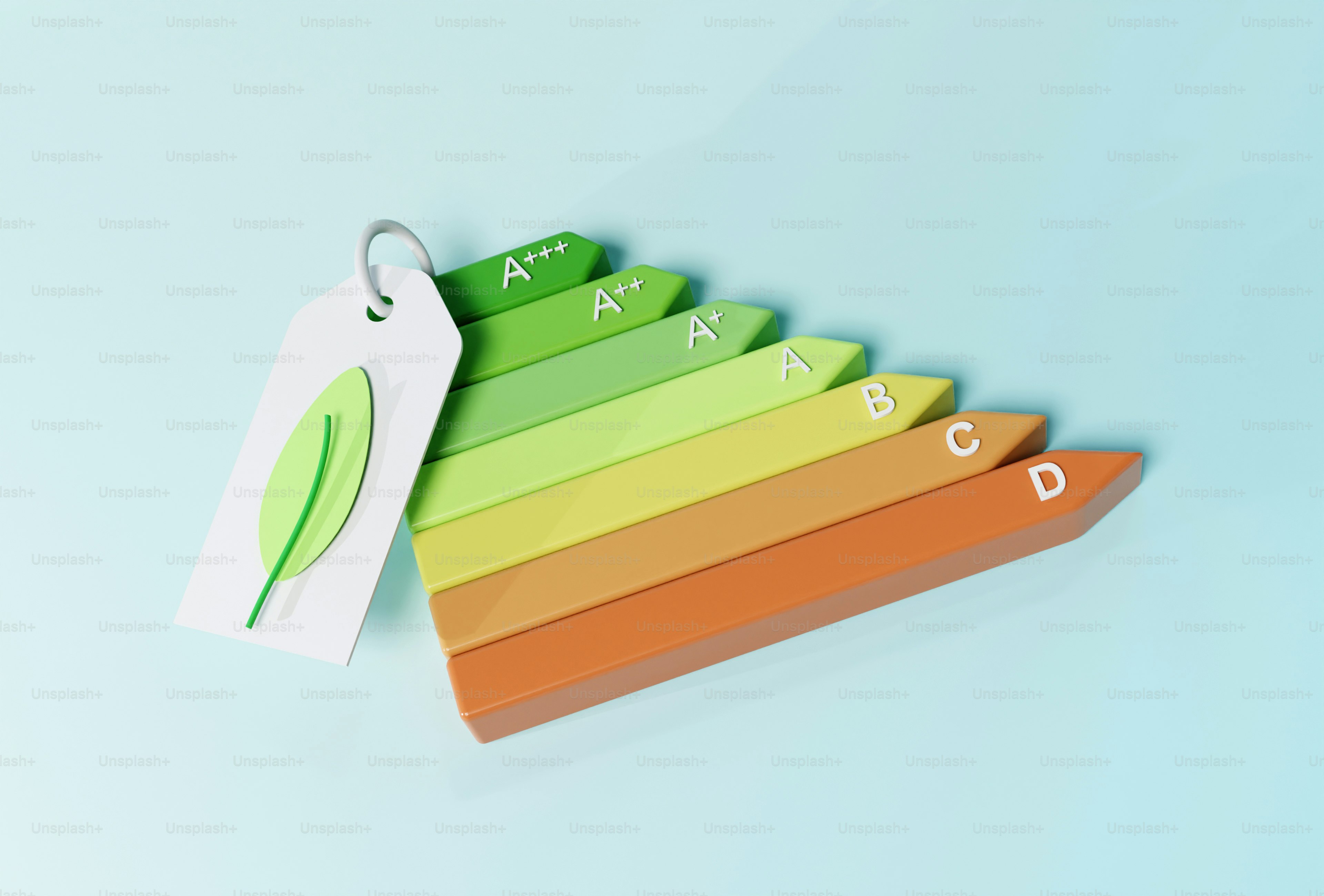 a key chain with a green leaf on top of it