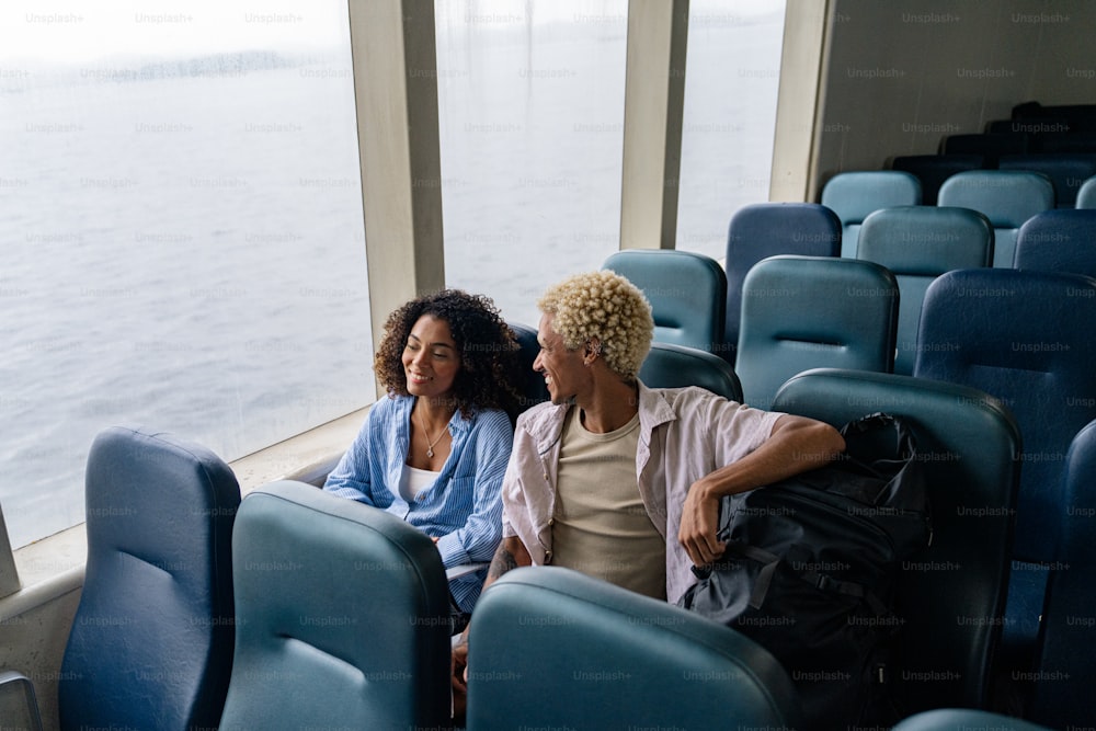 a couple of women sitting next to each other