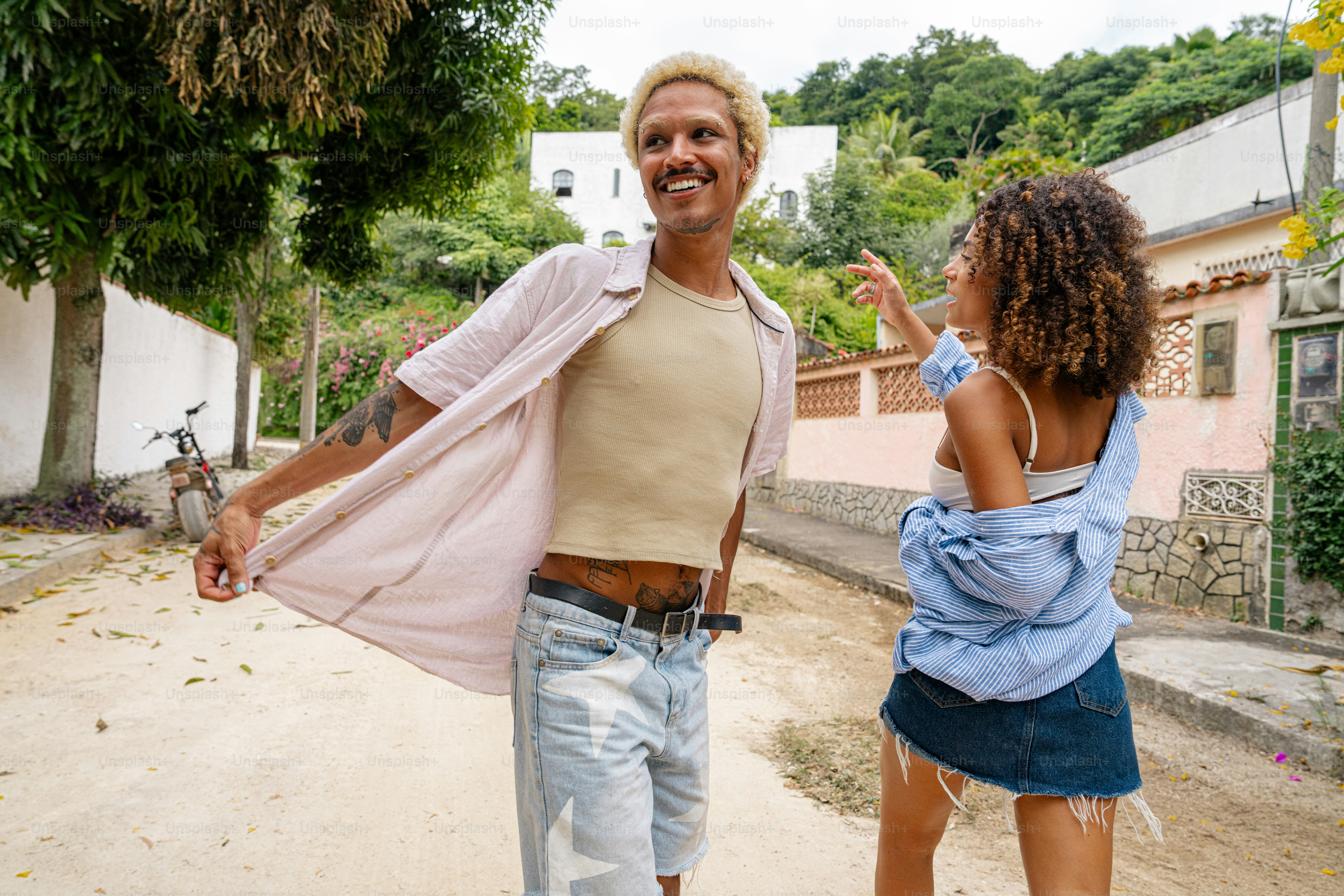 a man and a woman walking down a street