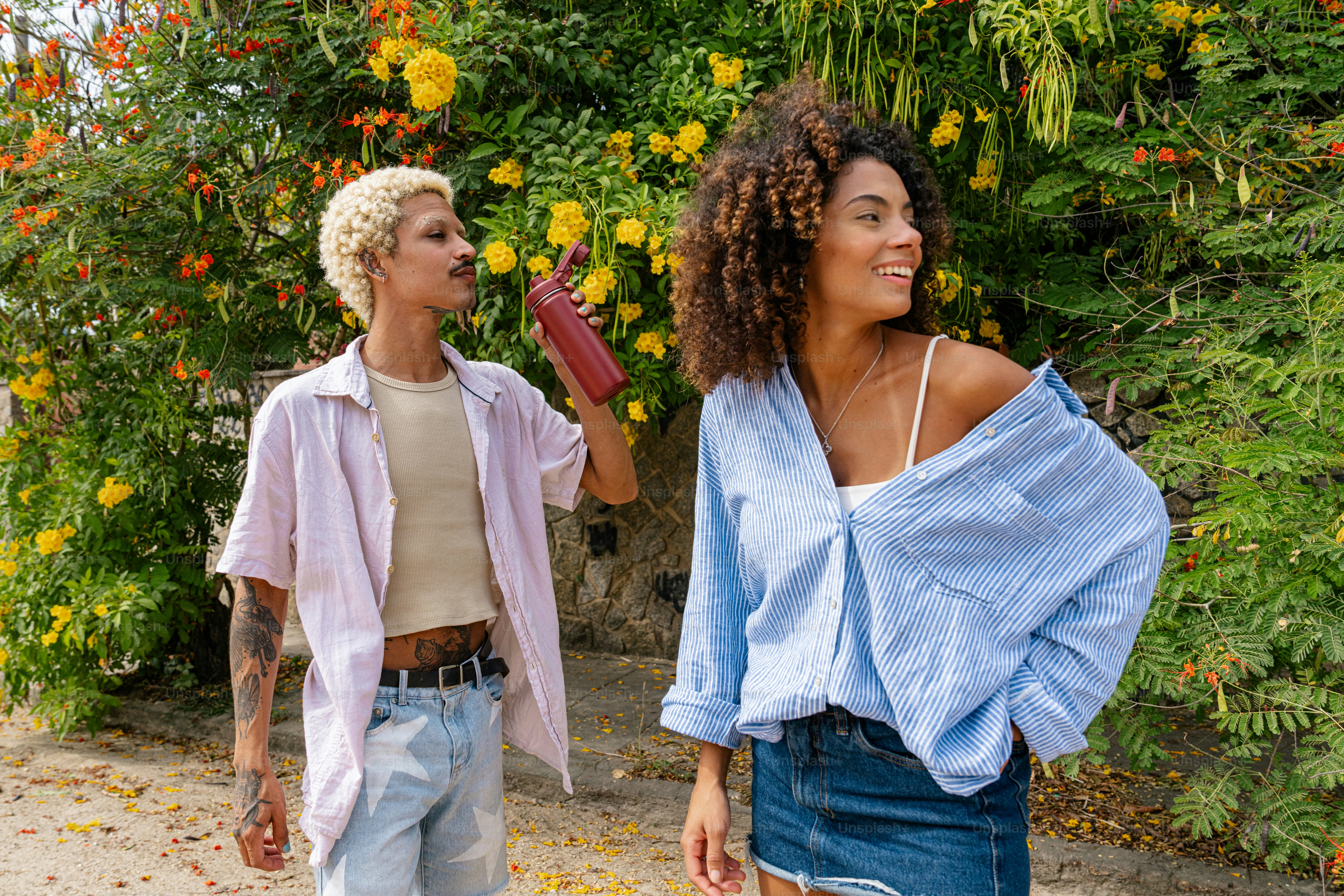 a couple of women standing next to each other