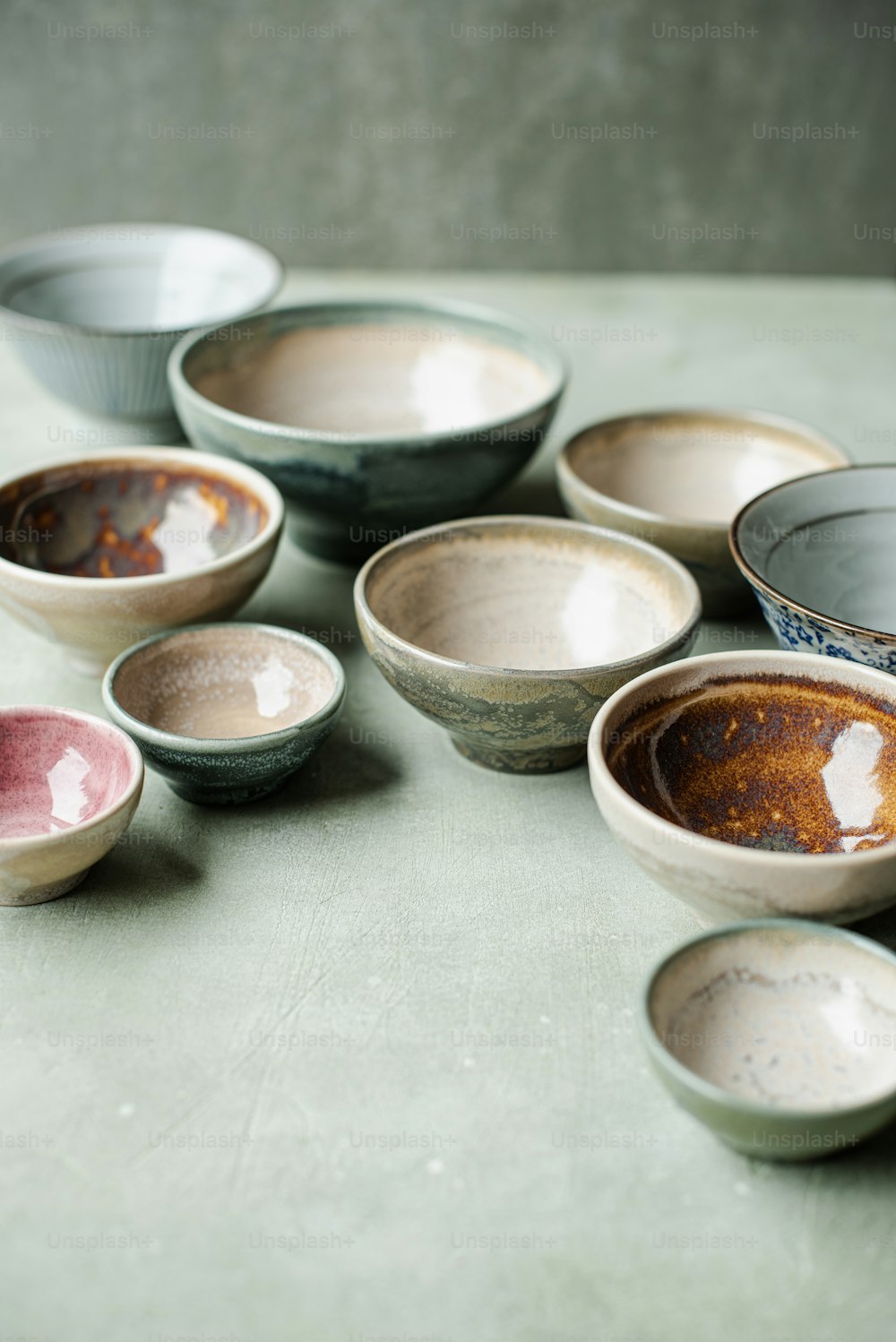 a group of bowls sitting on top of a table