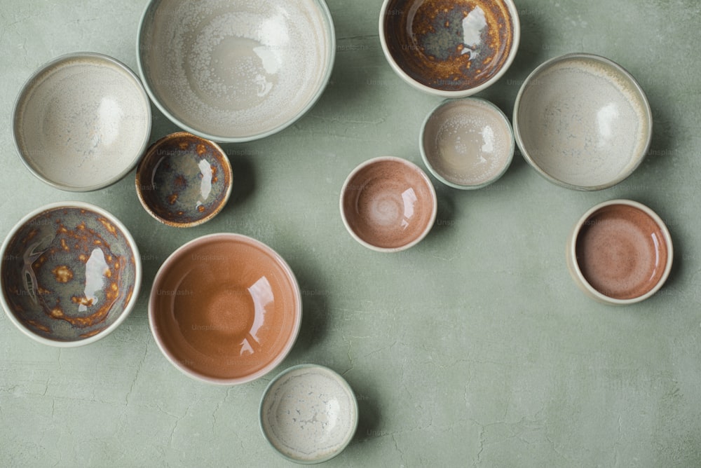 a group of bowls sitting on top of a table