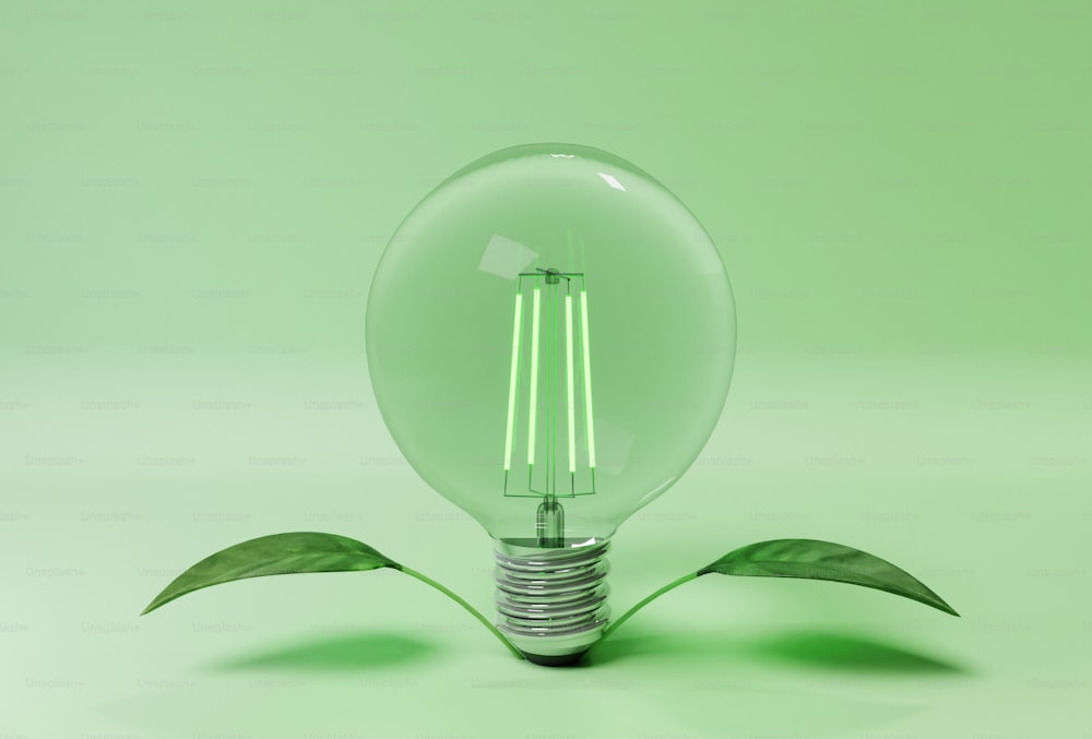 a light bulb sitting on top of a green surface