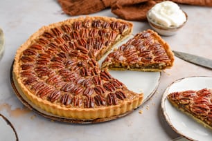 a pecan pie with a slice missing from it