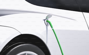 Un coche blanco con una boquilla de combustible verde unida a él