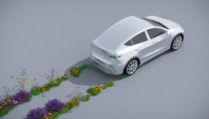 Un coche blanco está aparcado en un campo de flores