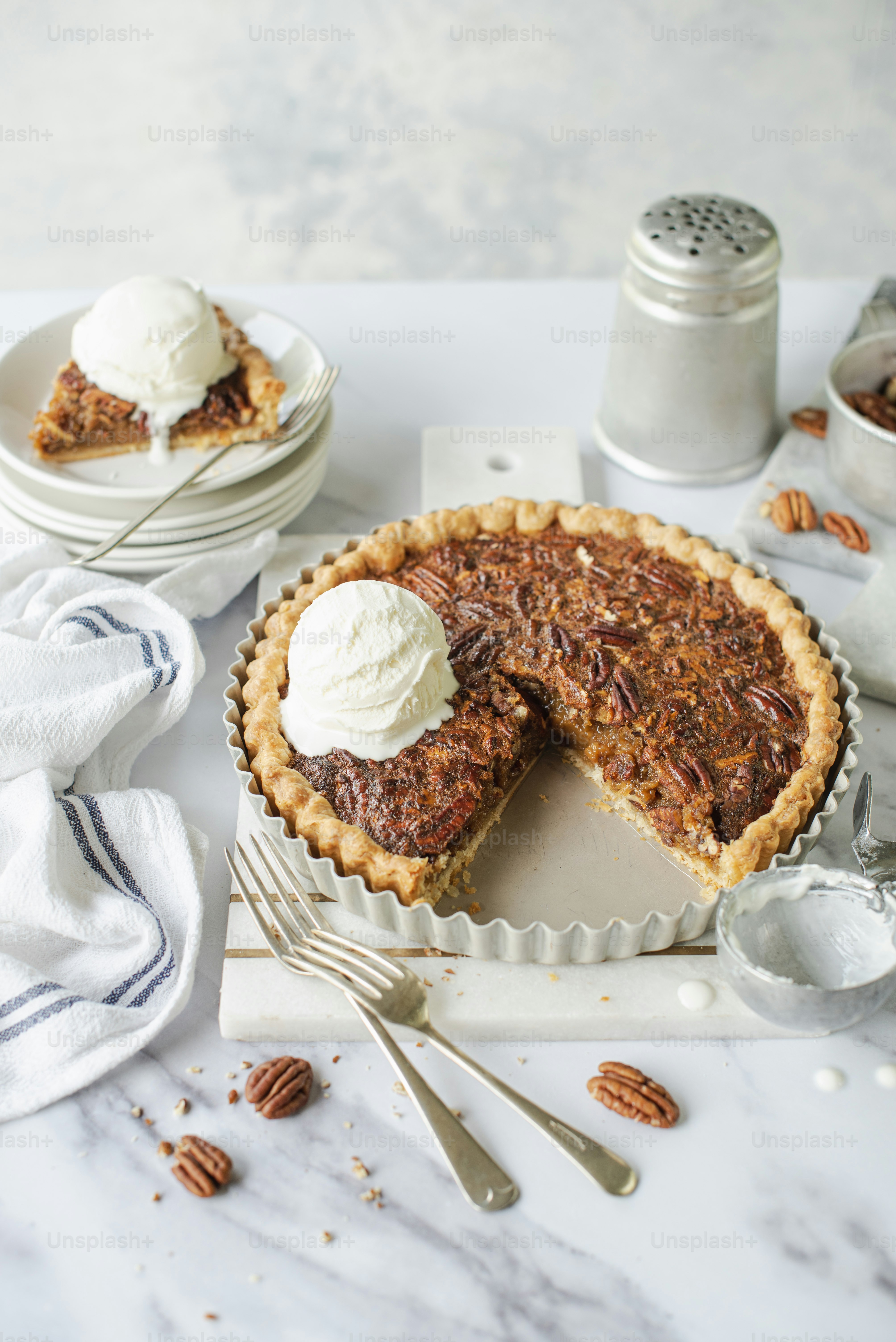 a pecan pie with a slice taken out of it