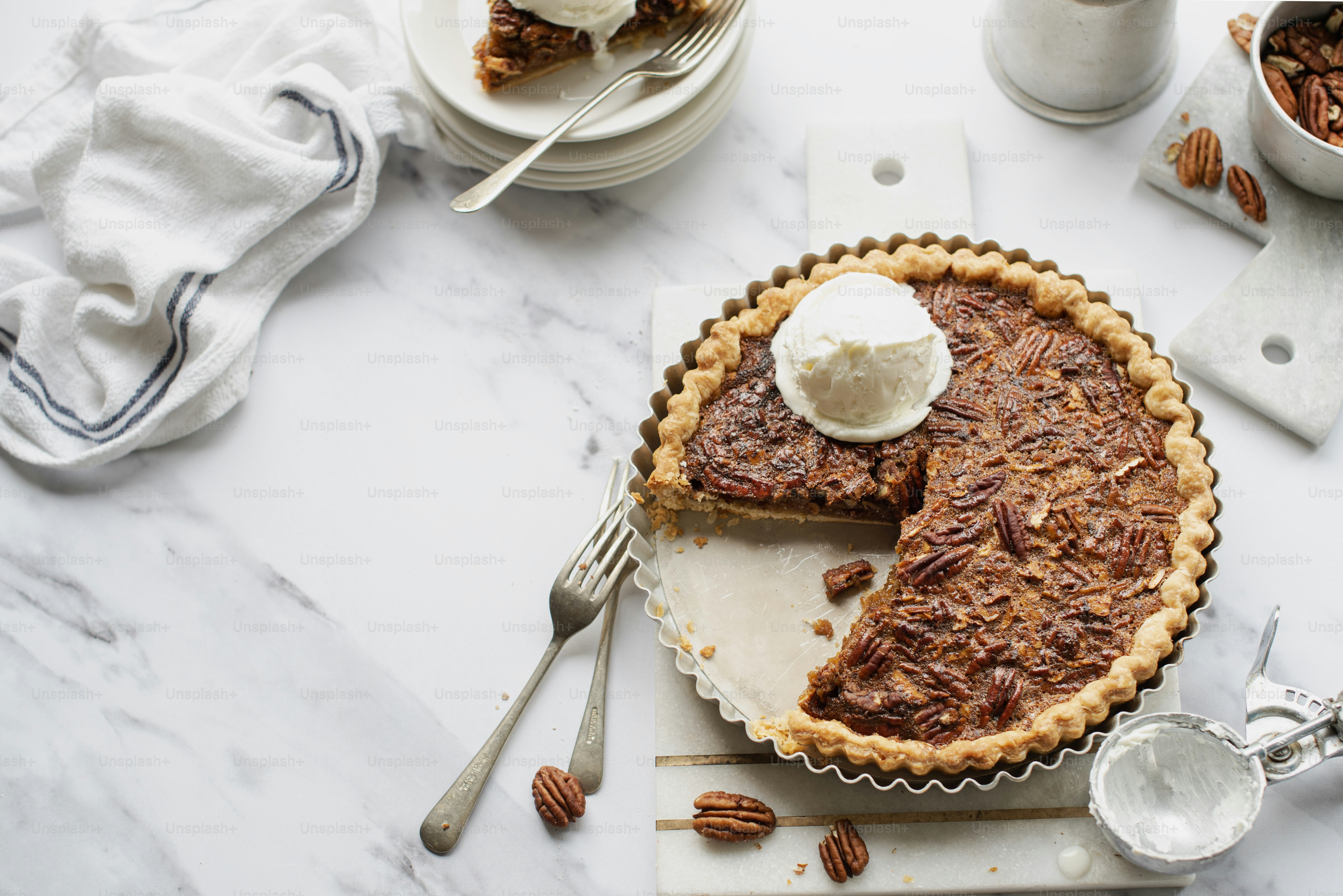 a pecan pie with a slice taken out of it