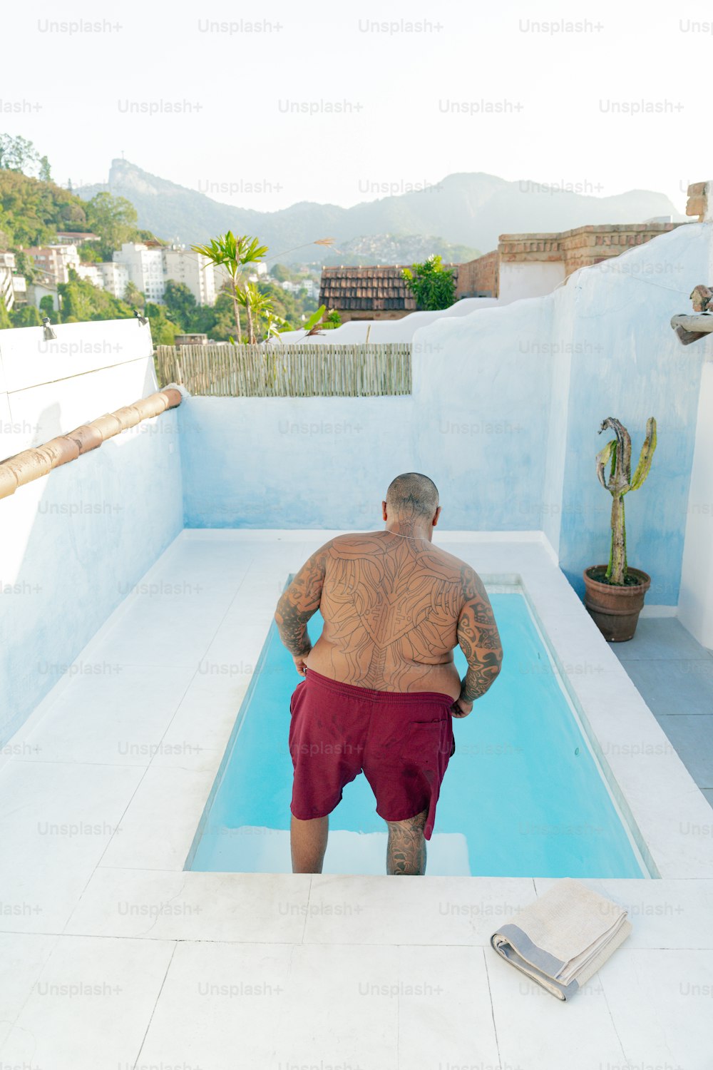 a man standing in a pool of water