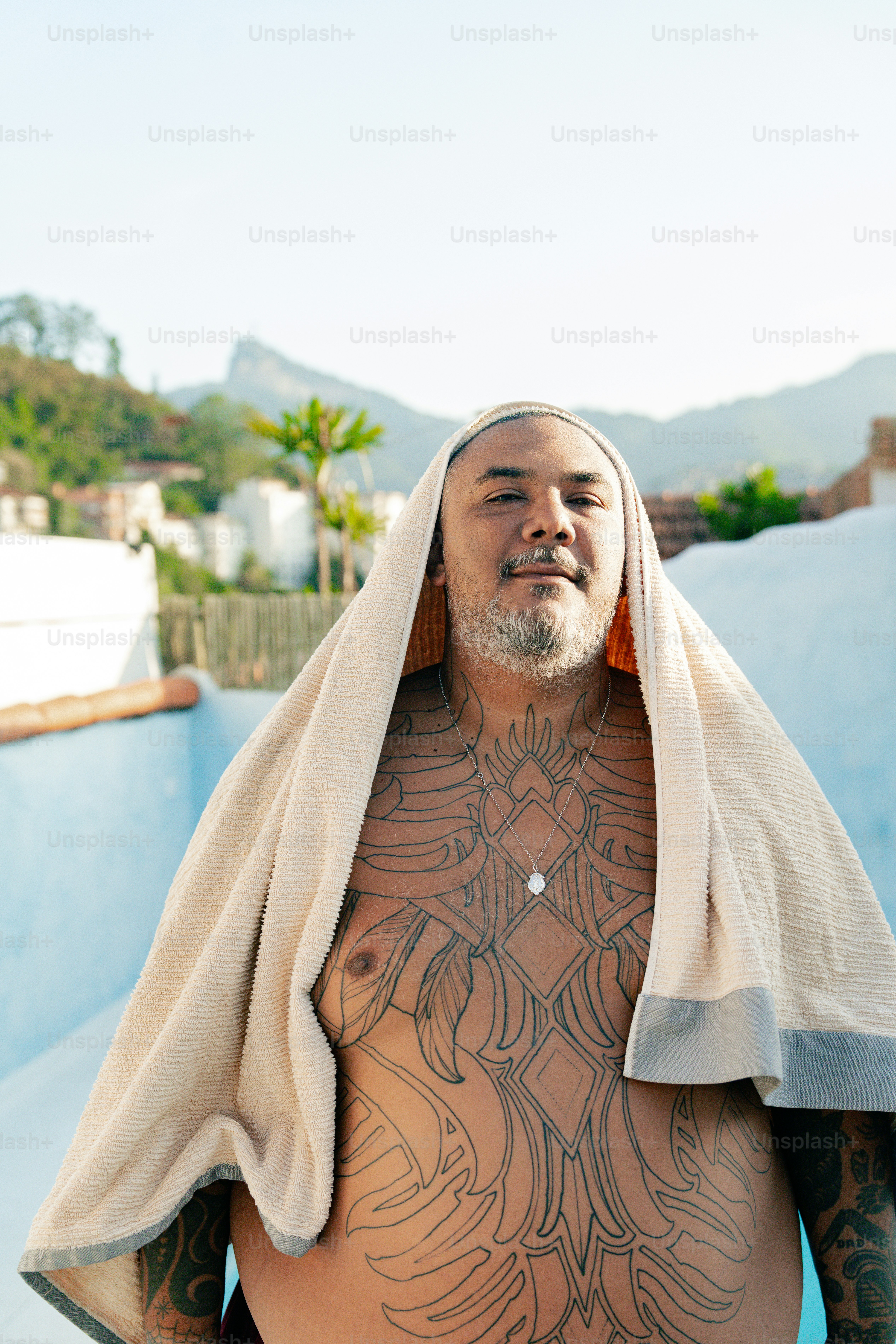 a man with a towel on his head