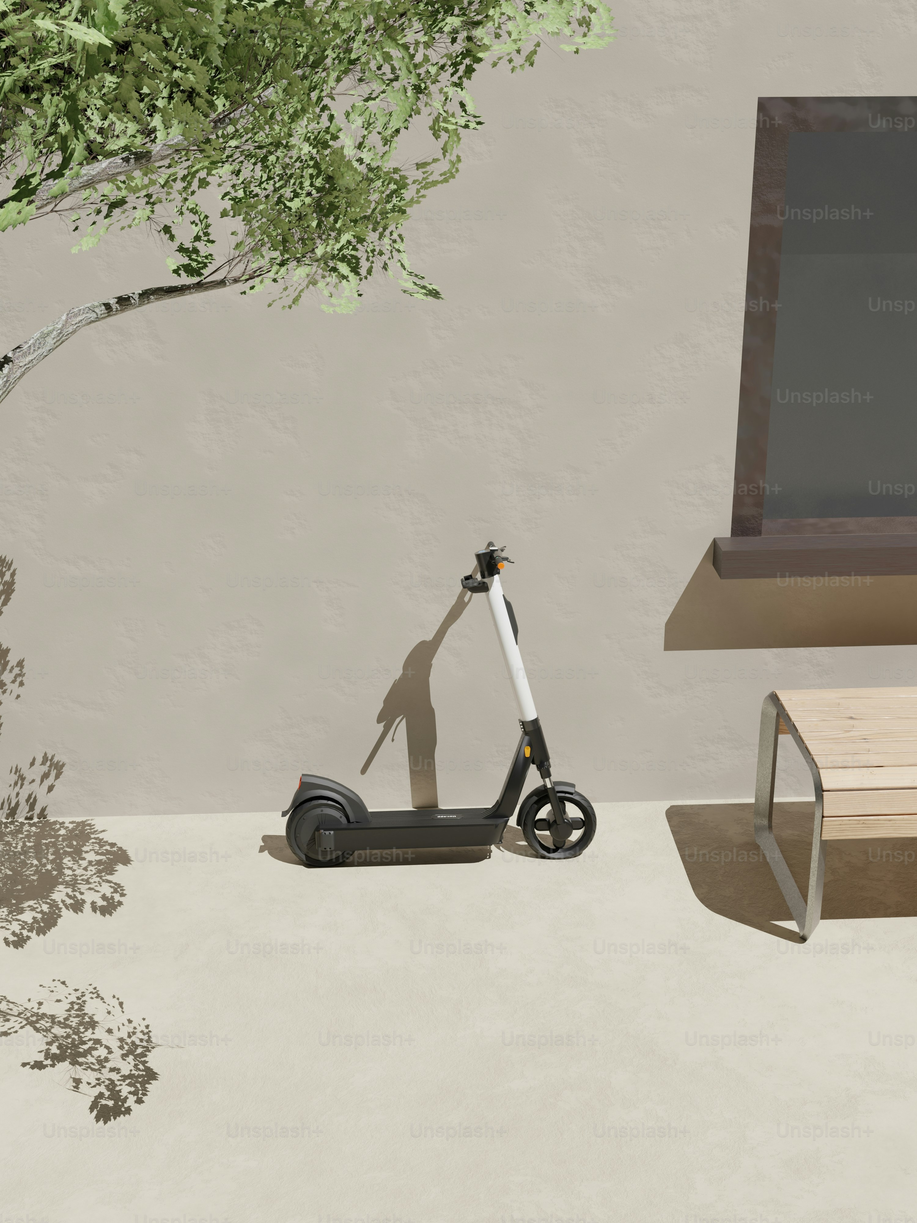 a scooter is parked in front of a tree