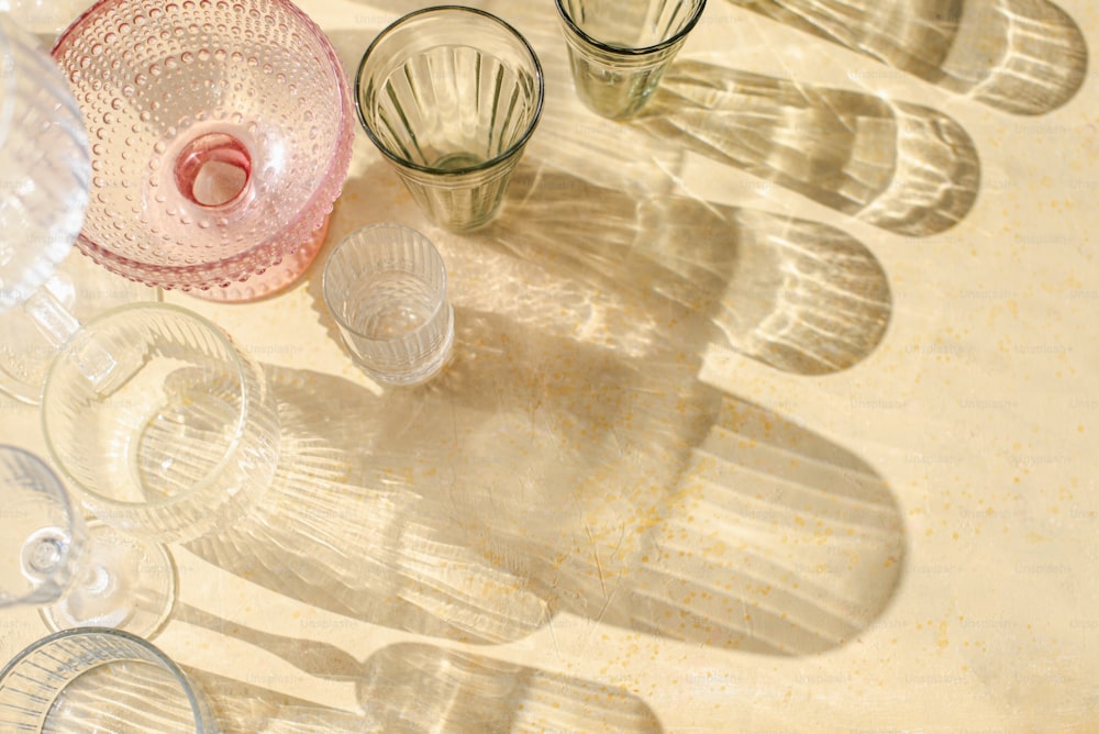 a group of wine glasses sitting on top of a table