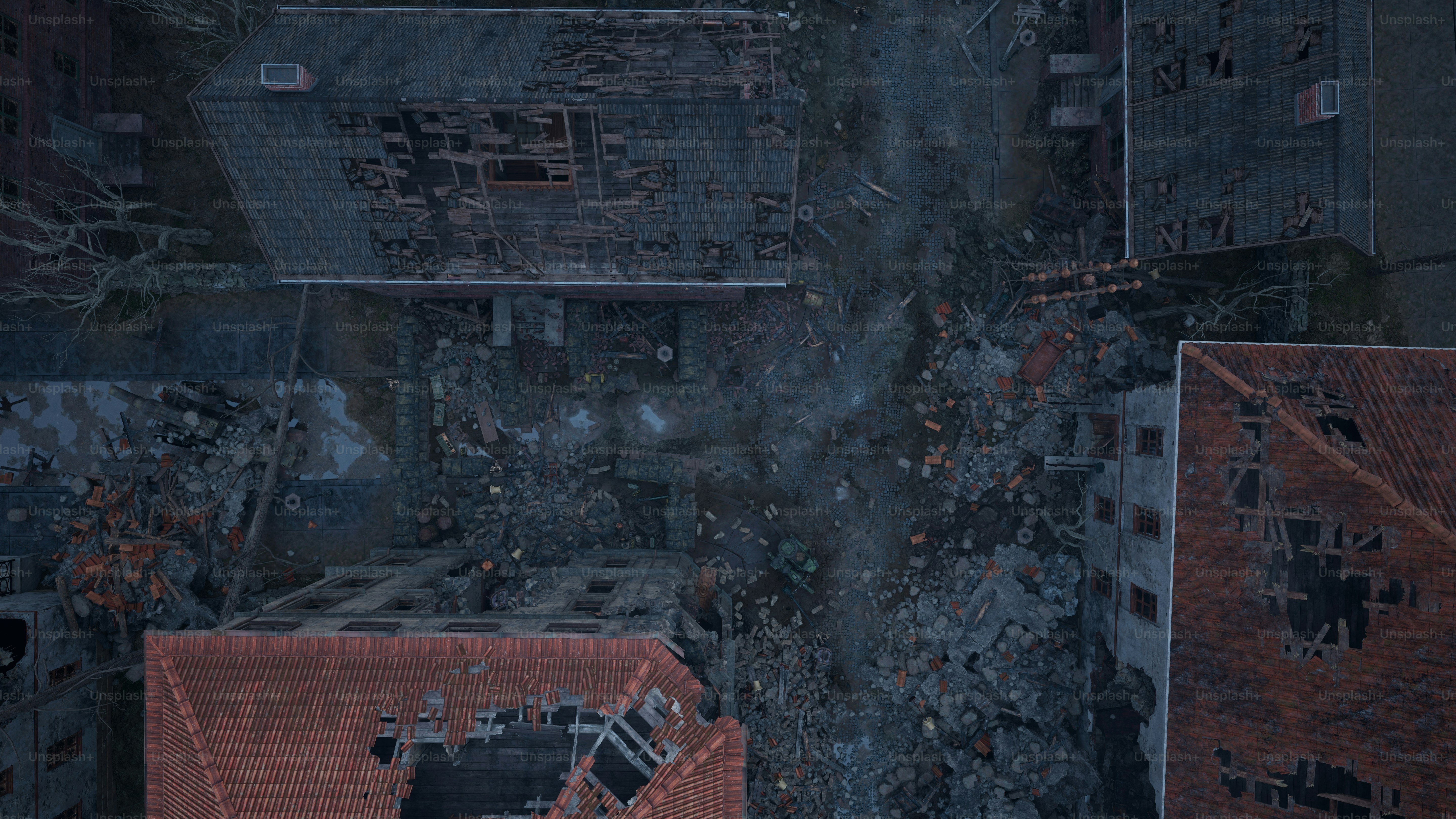 an aerial view of a building with a red roof