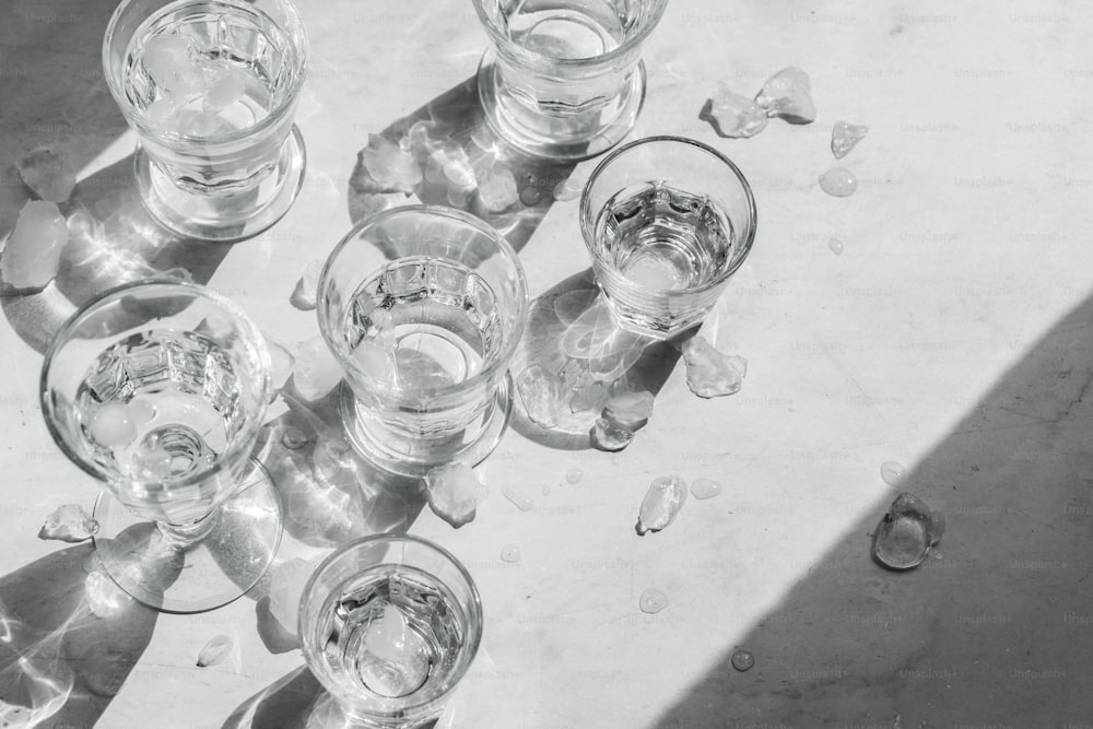 a group of glasses sitting on top of a table