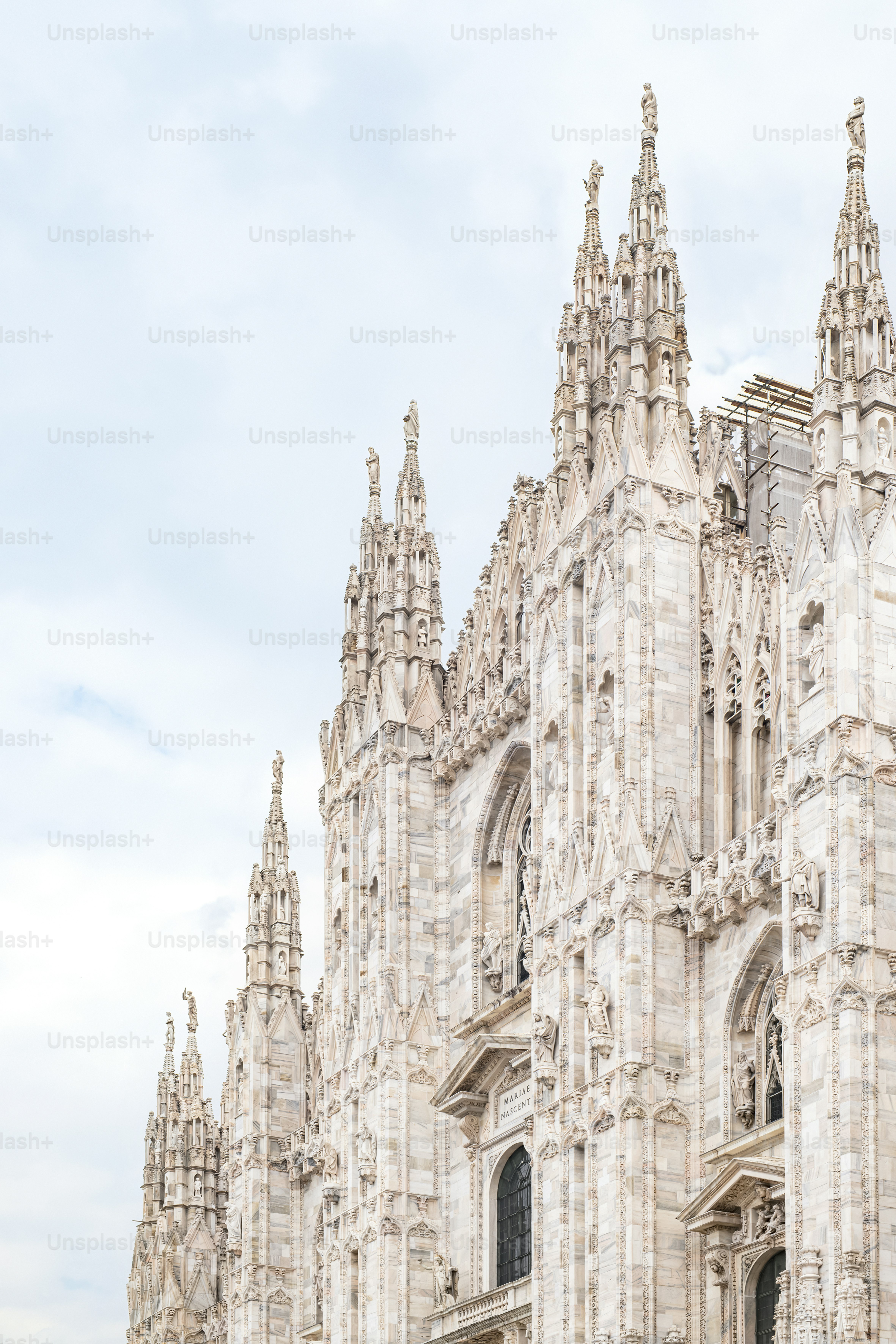 a large cathedral with a clock on the front of it
