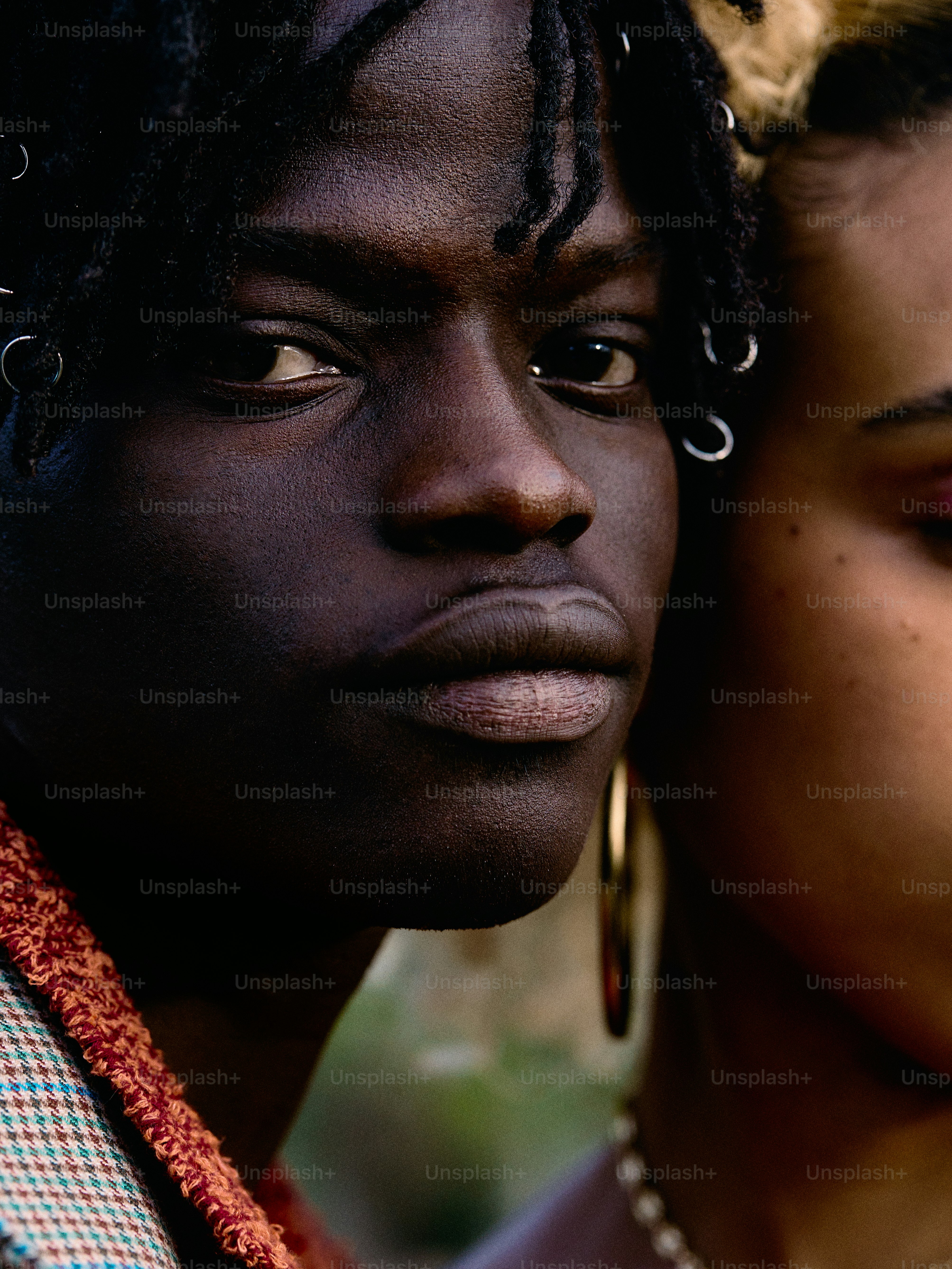 a couple of women standing next to each other