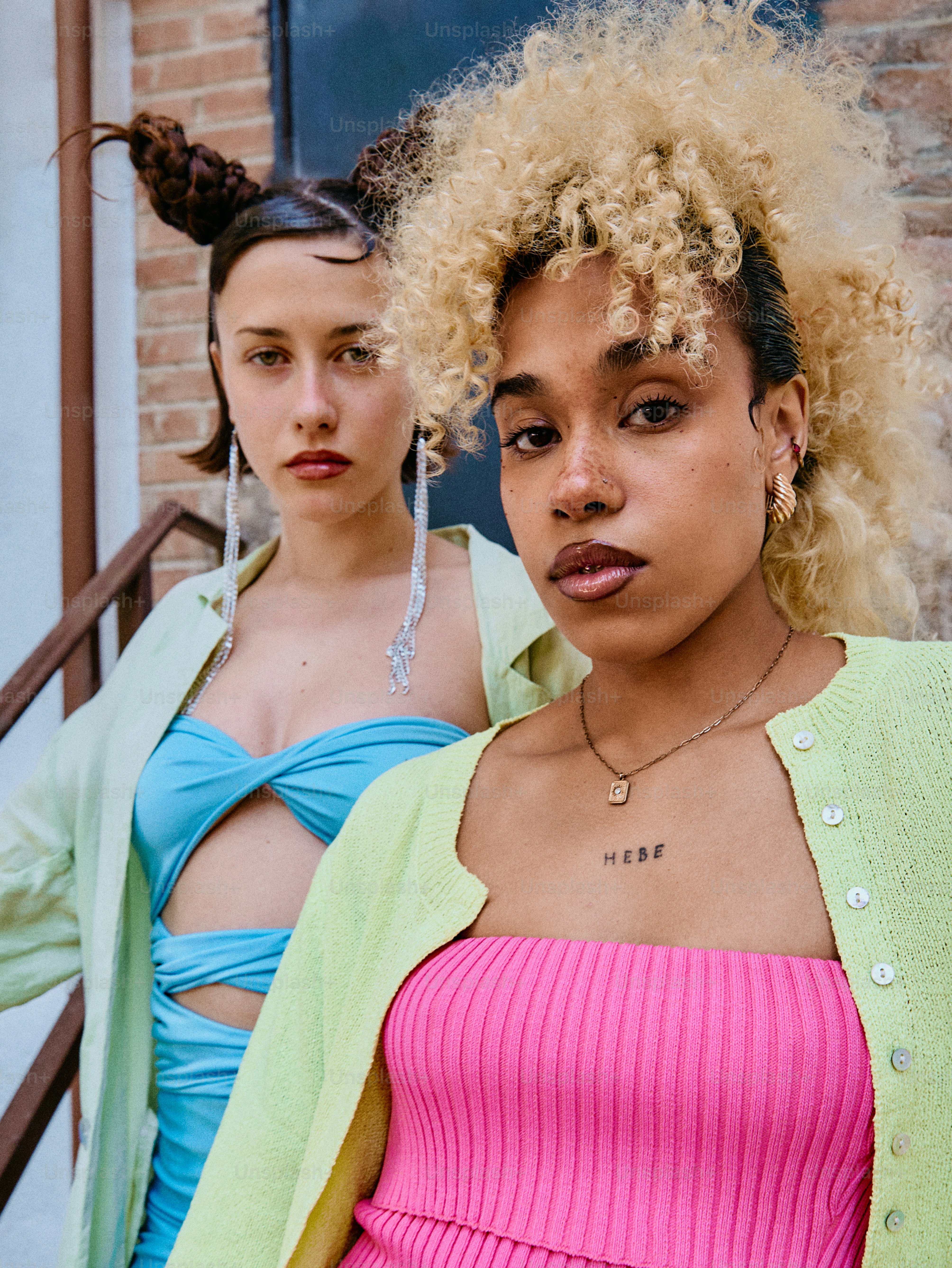 two young women standing next to each other