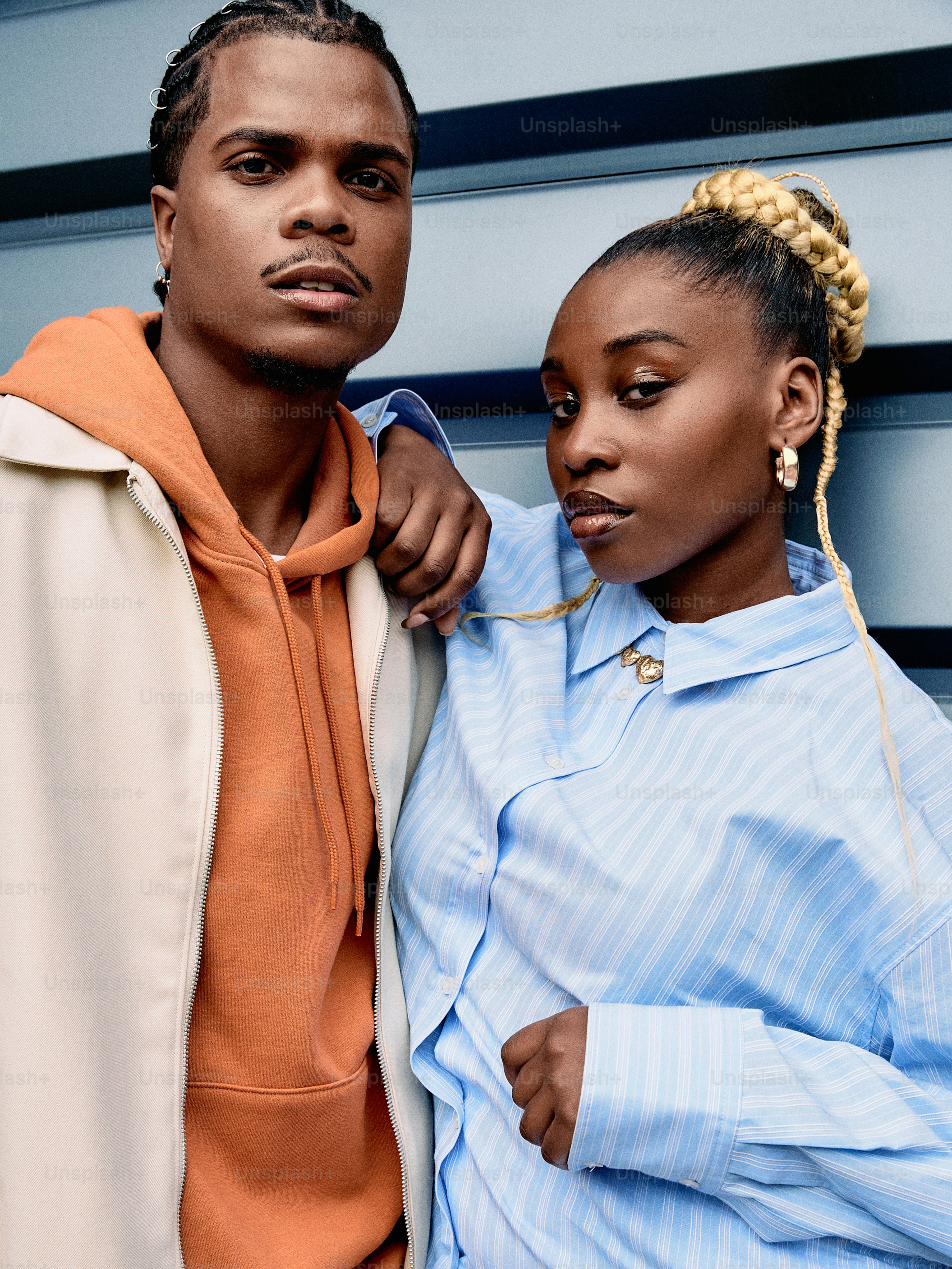 a man and a woman standing next to each other