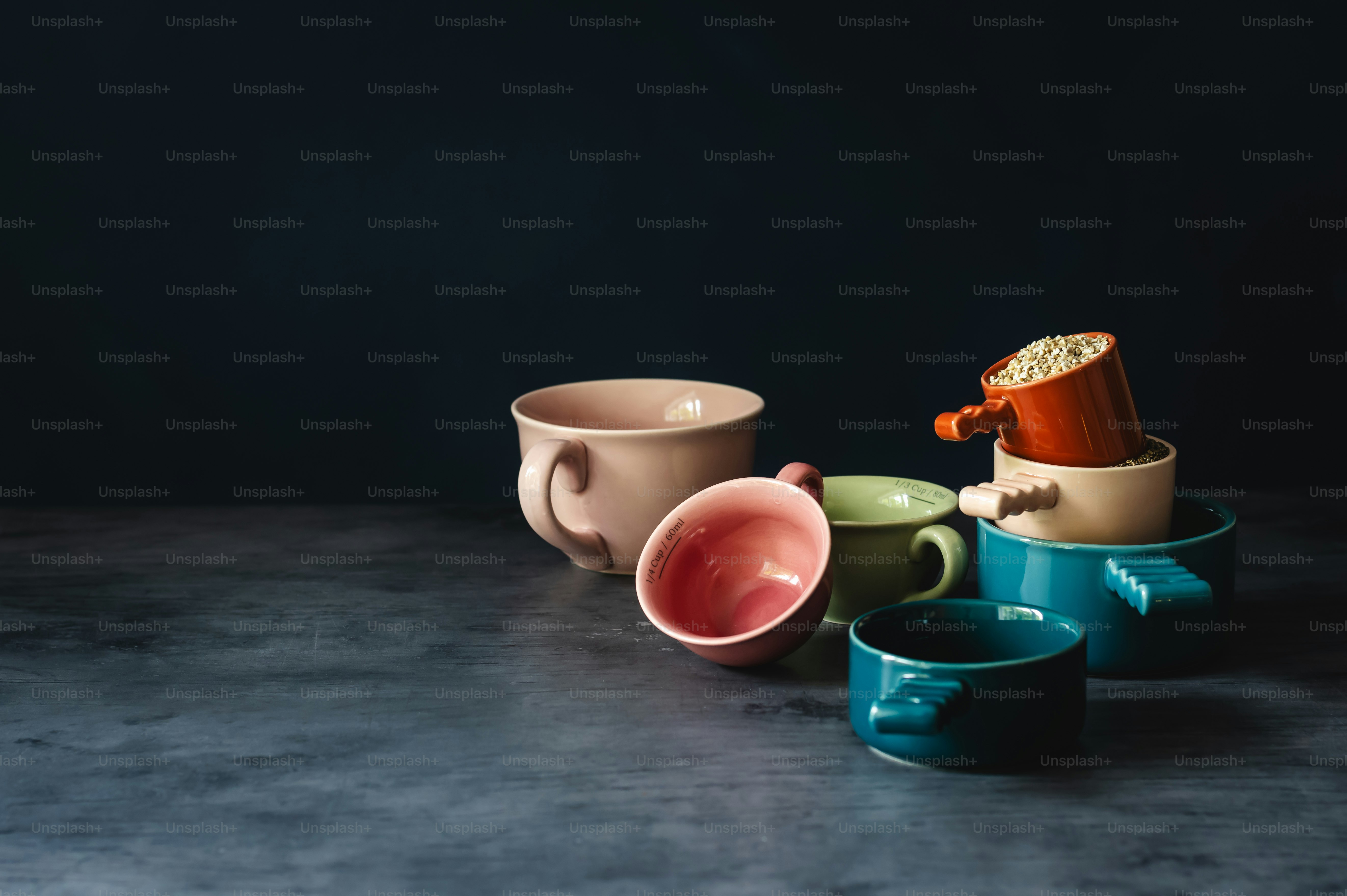 a group of coffee cups sitting on top of each other