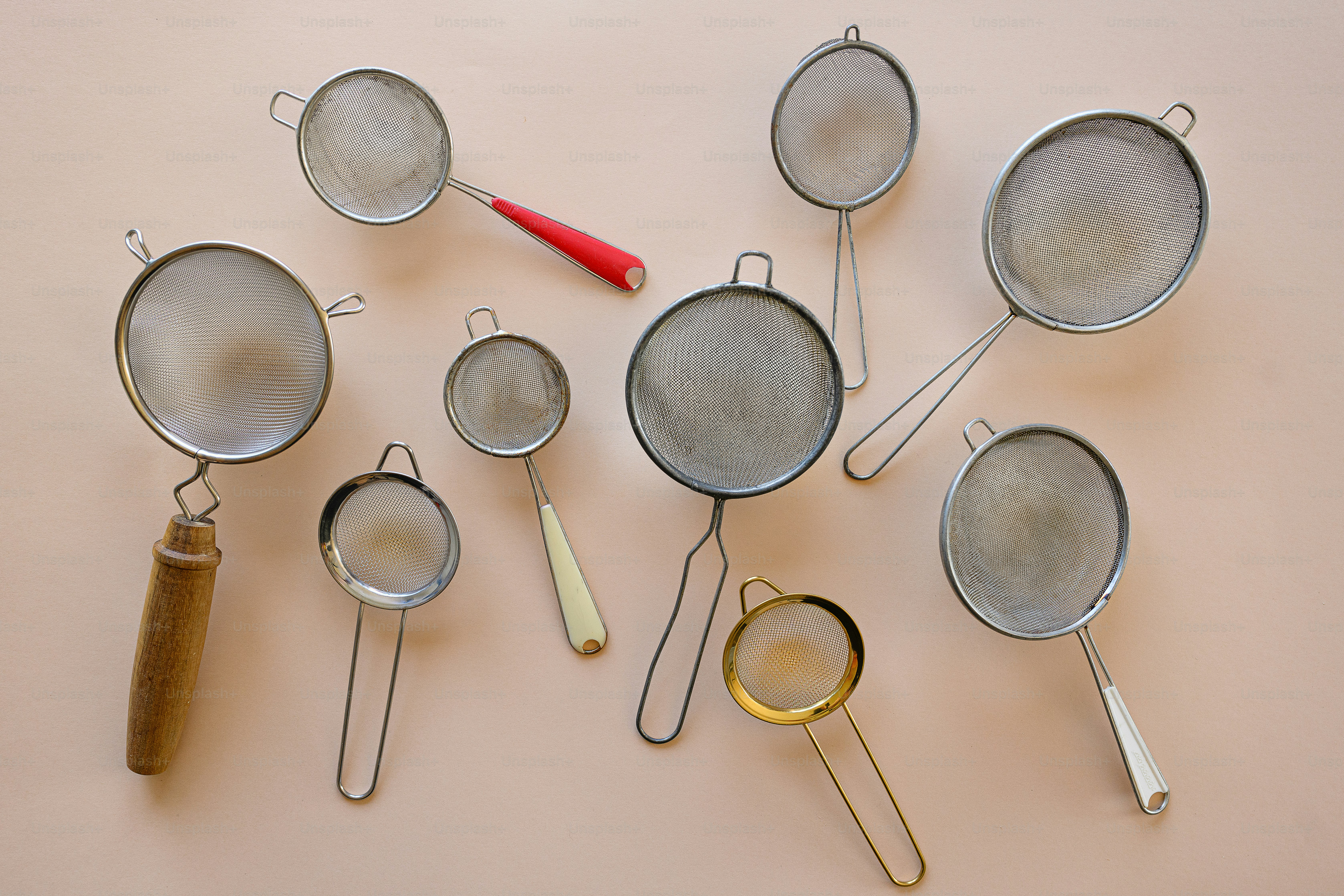 a group of metal pans sitting on top of a table