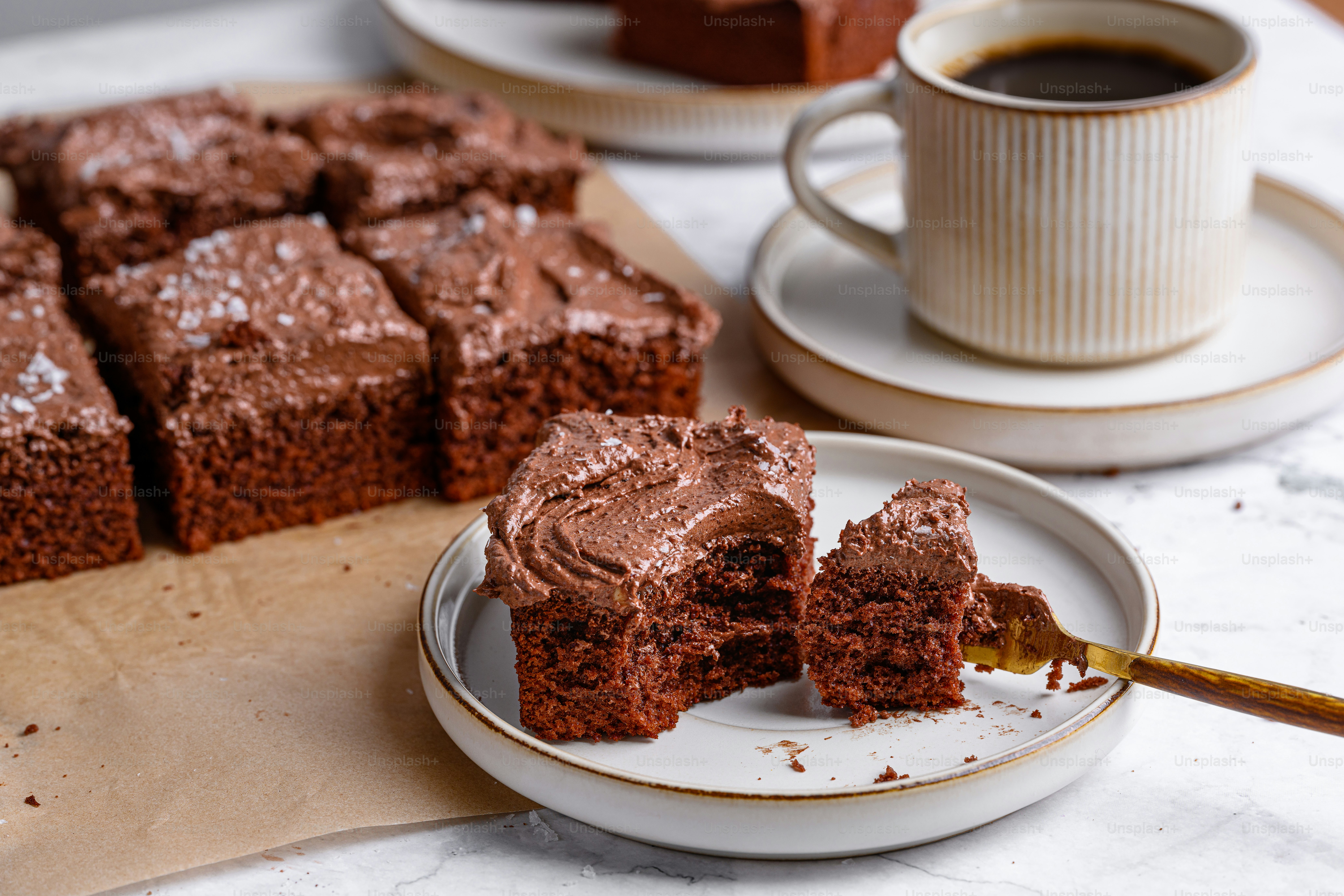 a plate with a piece of chocolate cake on it