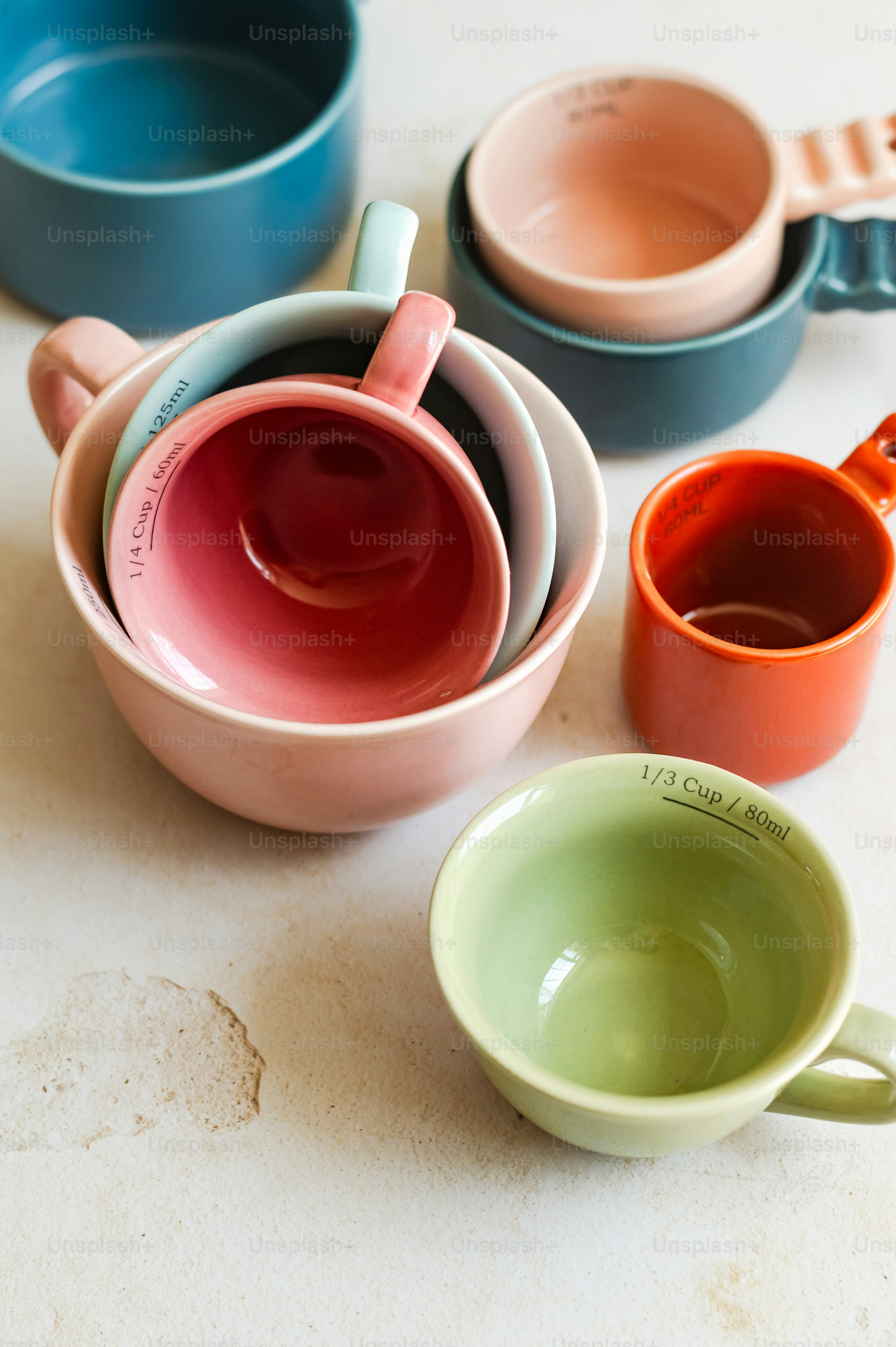 a group of three cups sitting on top of a table