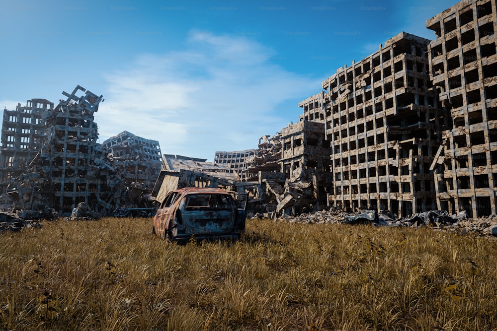 an abandoned building in a field with a truck in the foreground