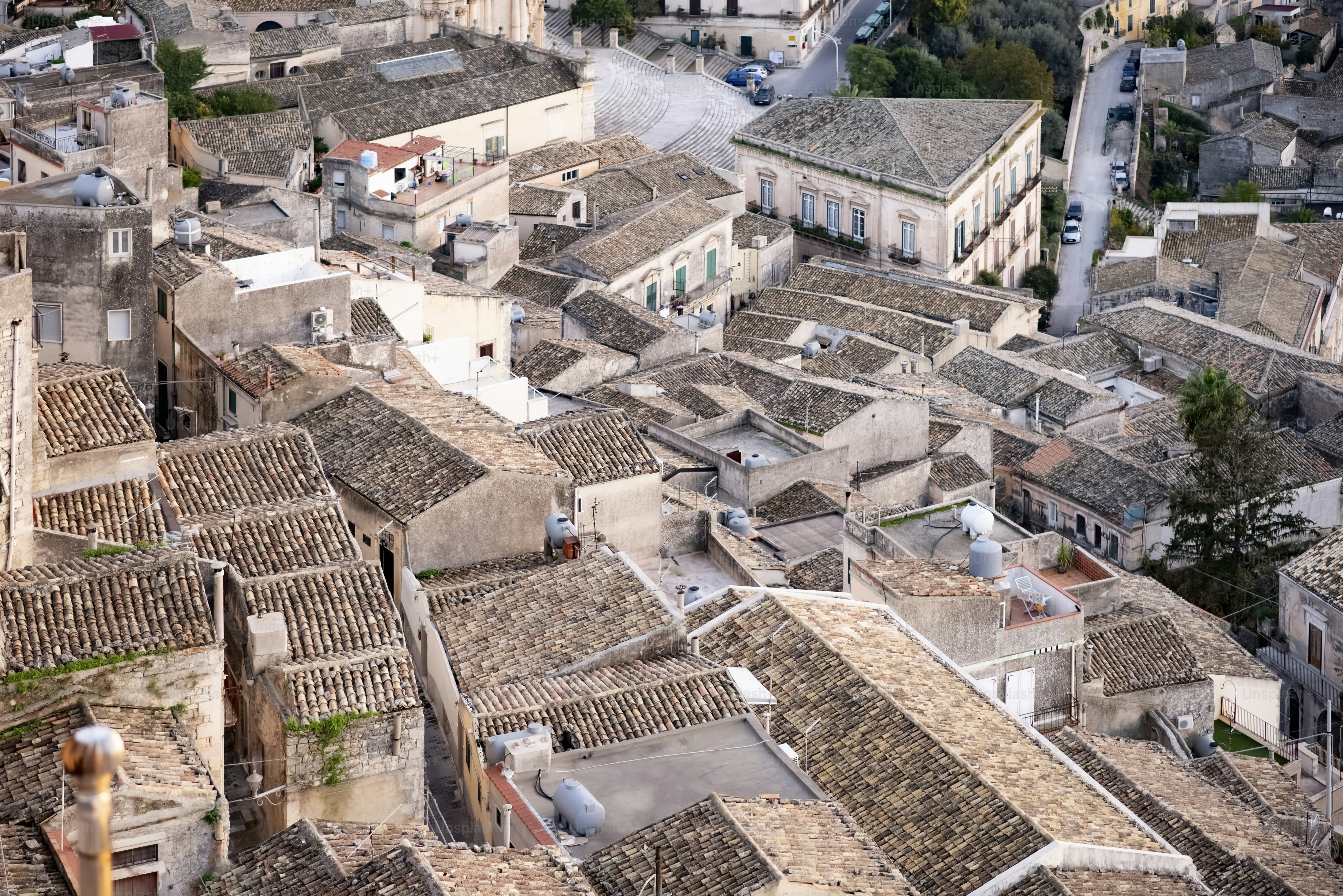 an aerial view of a city with old buildings