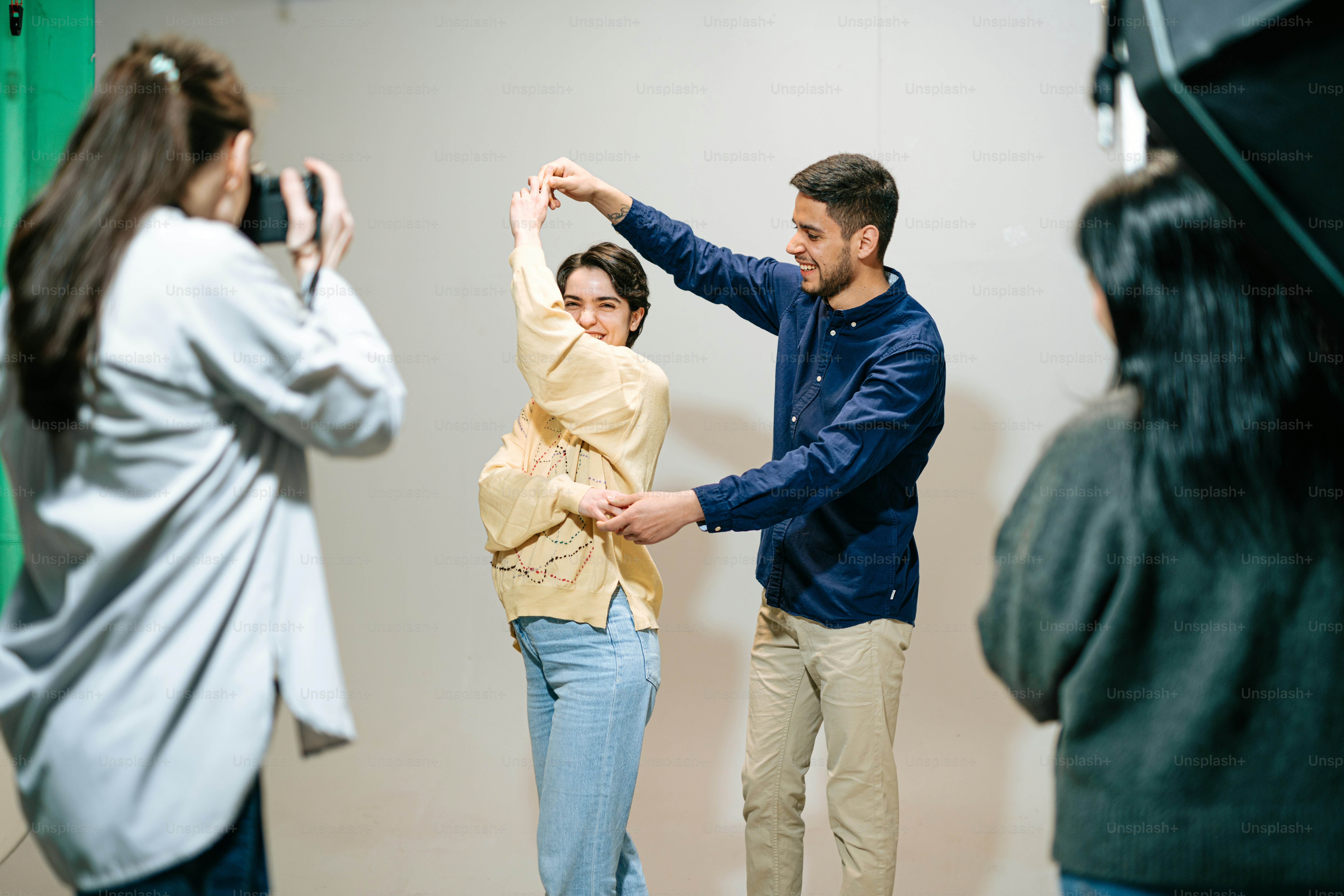 a group of people standing around each other