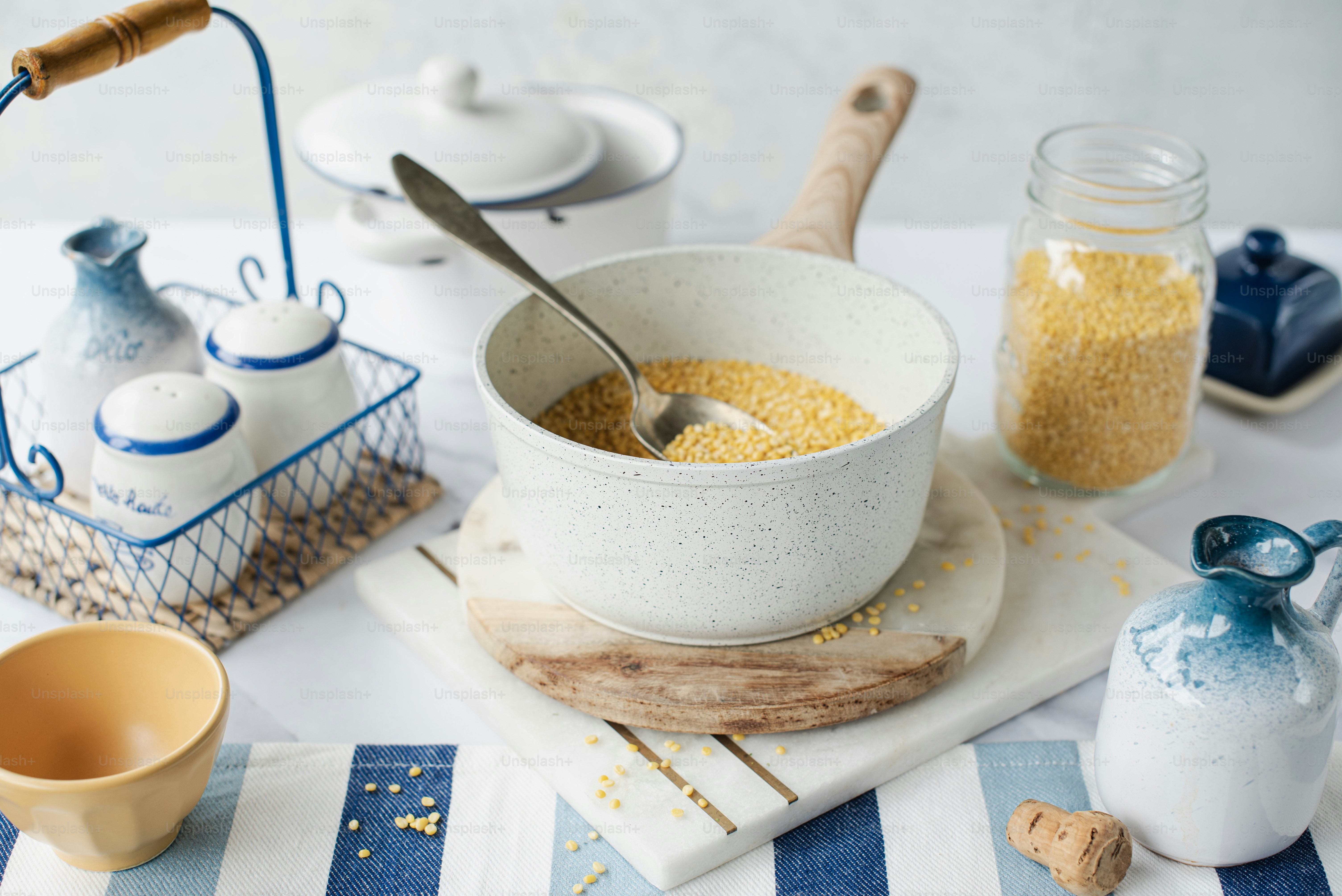 a table topped with a bowl of cereal