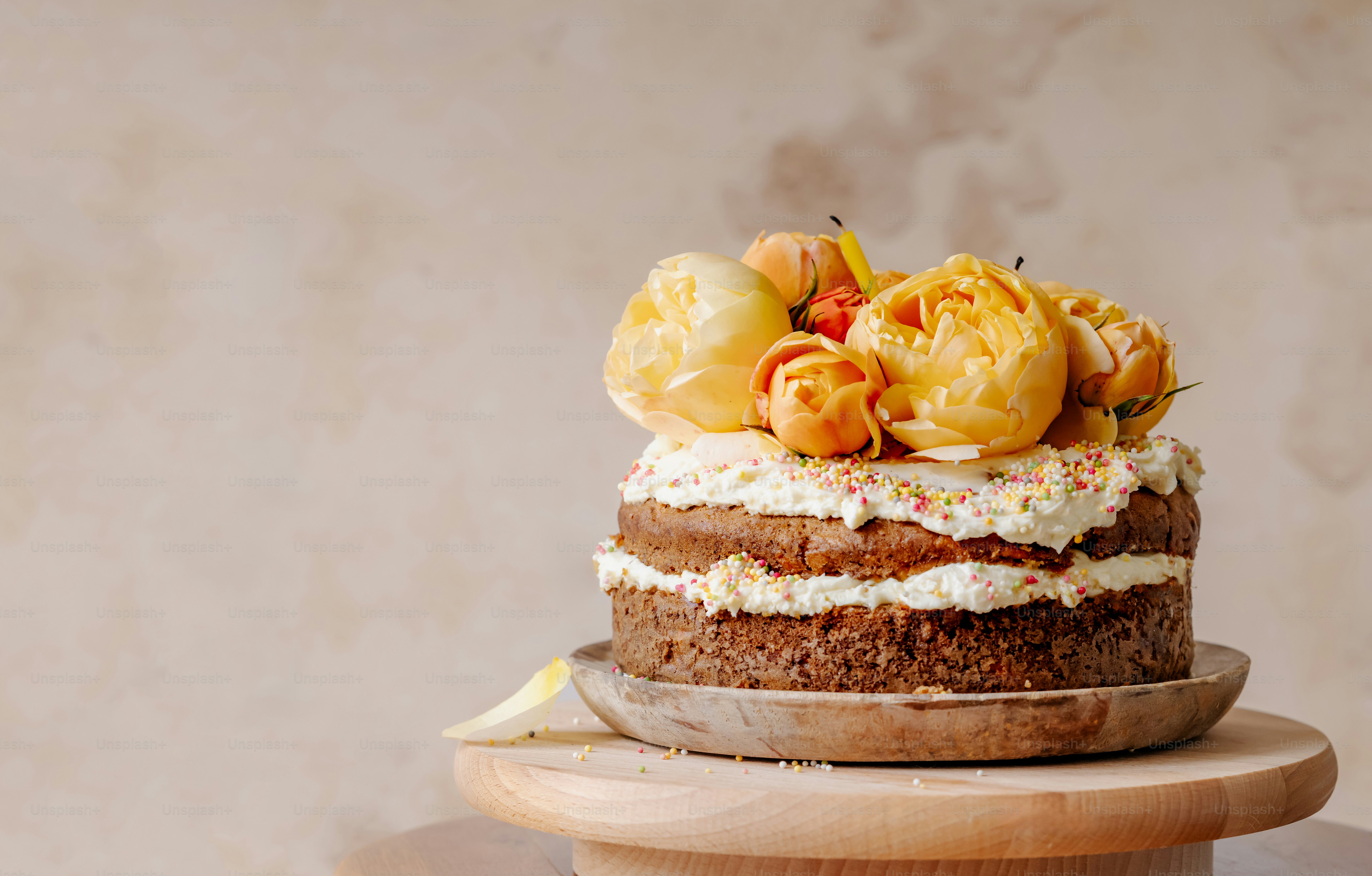 a cake sitting on top of a wooden table
