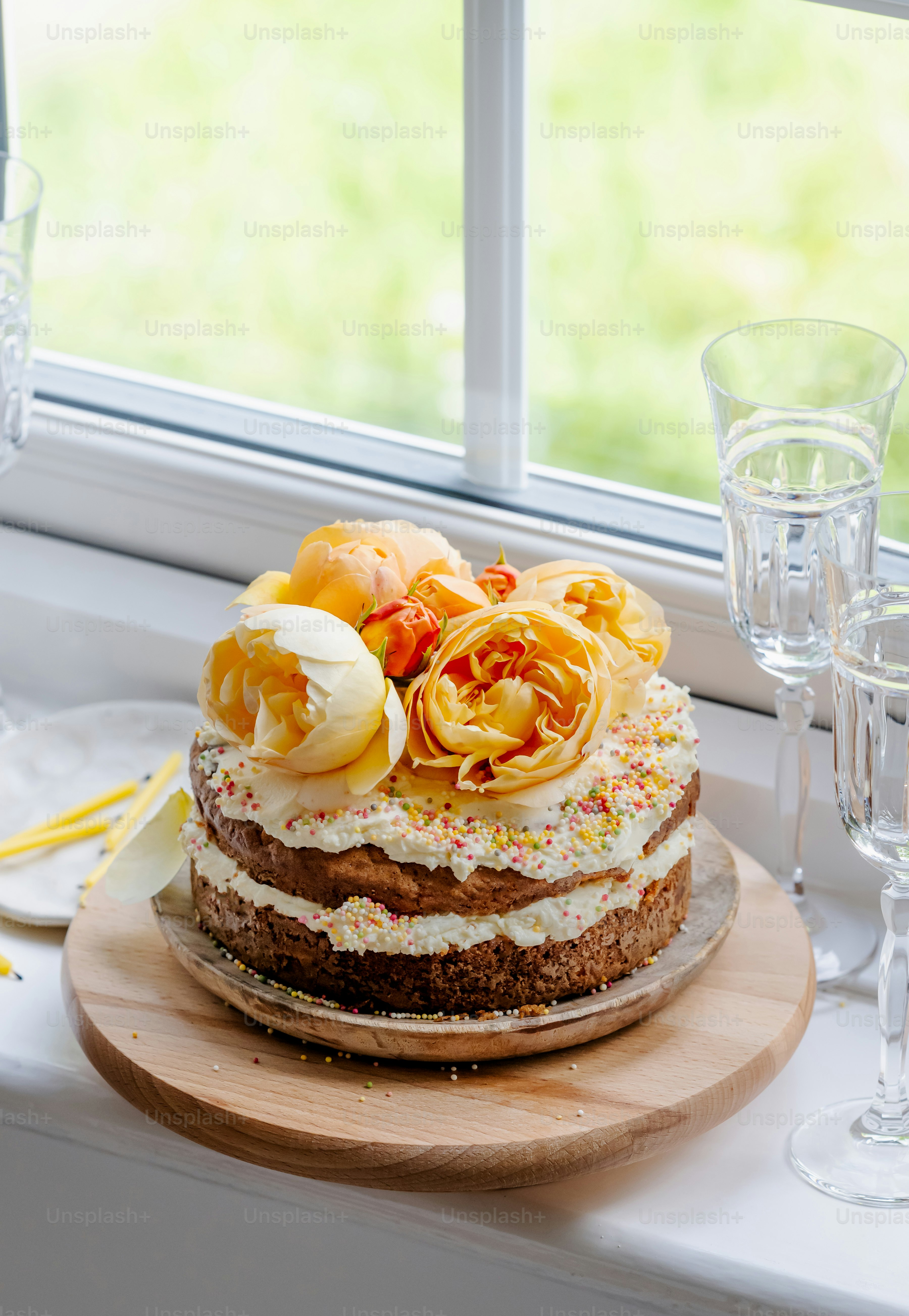 a cake sitting on top of a wooden plate