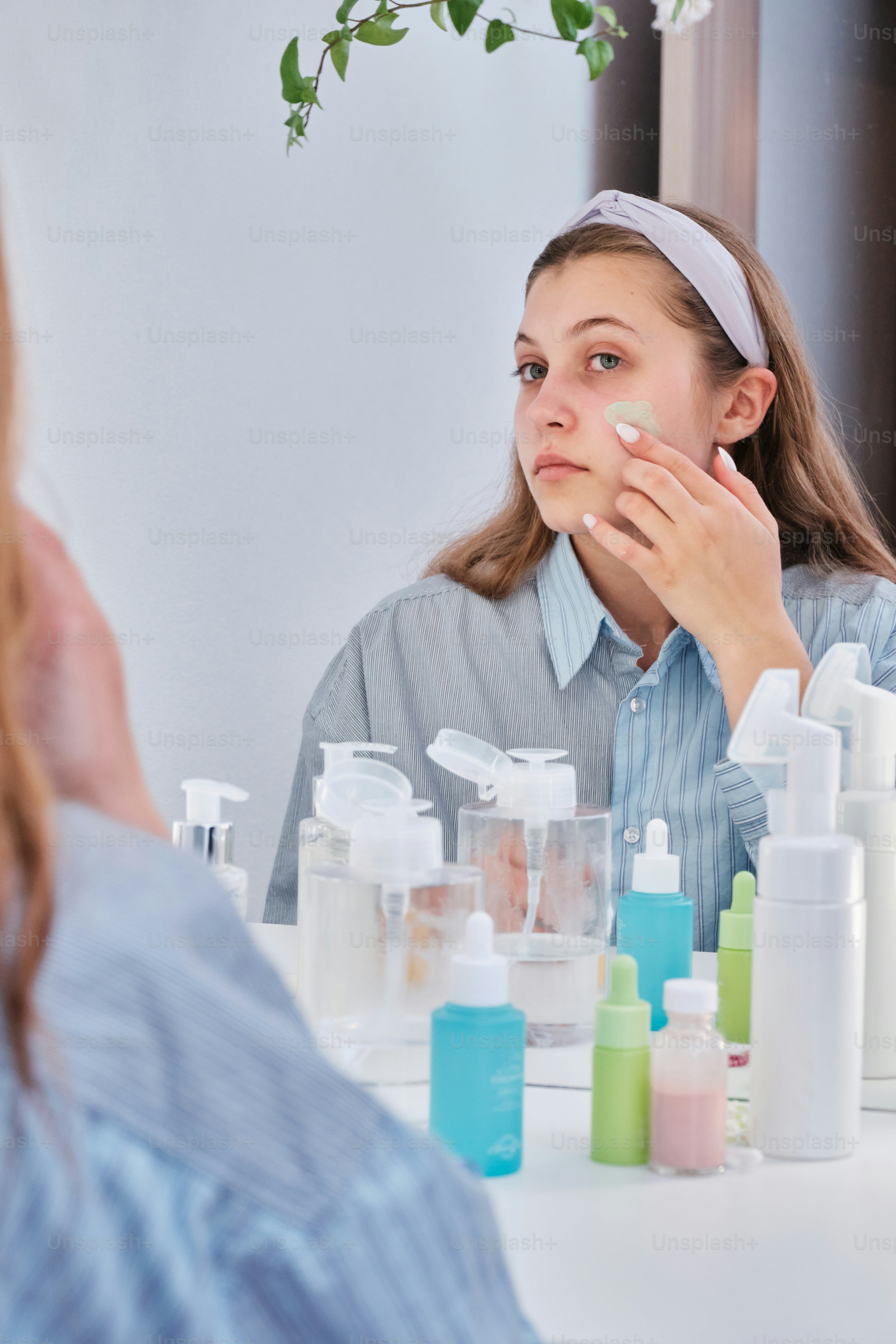 Consumer checking beauty product ingredients on a skincare label before buying