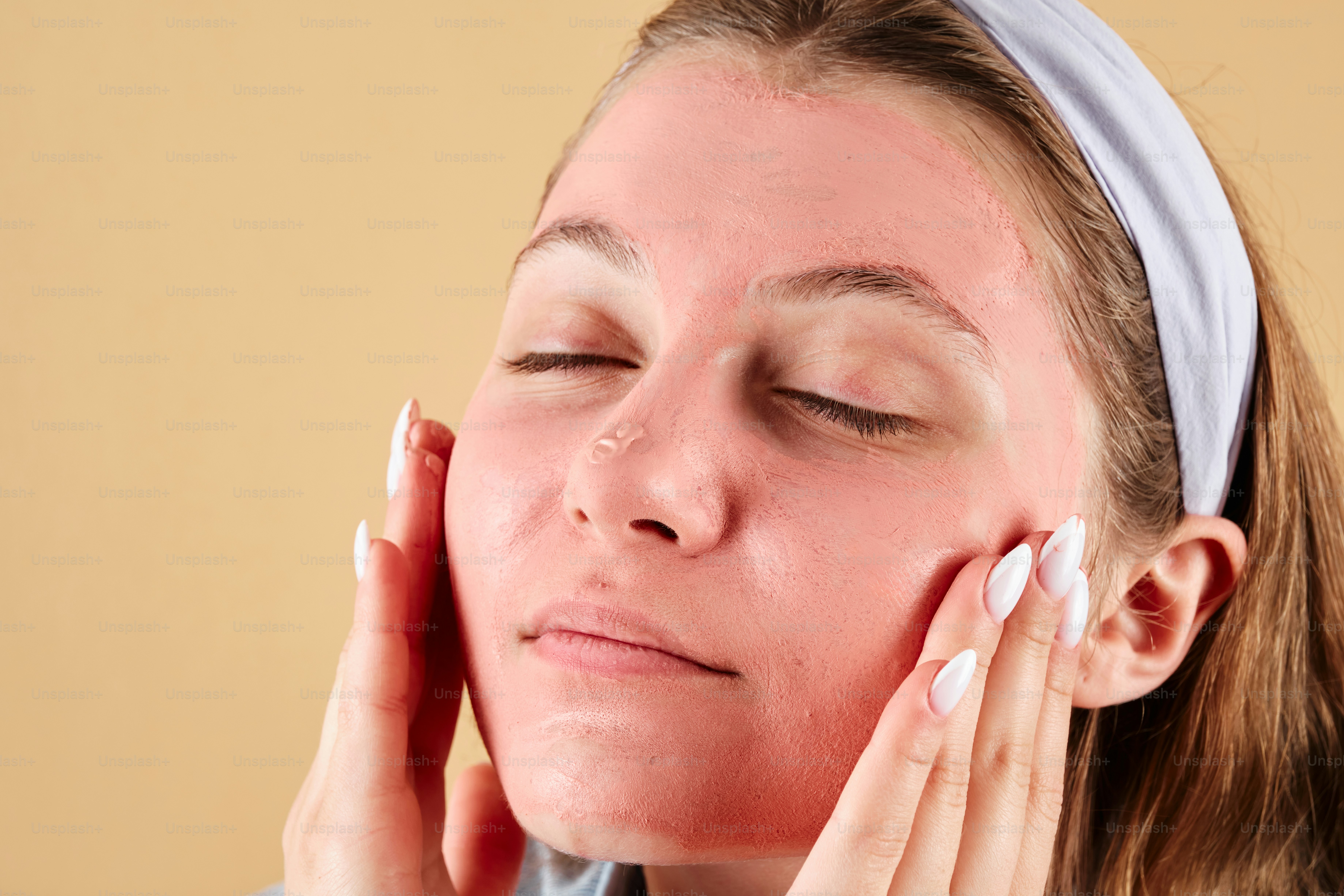 teen with clay face mask