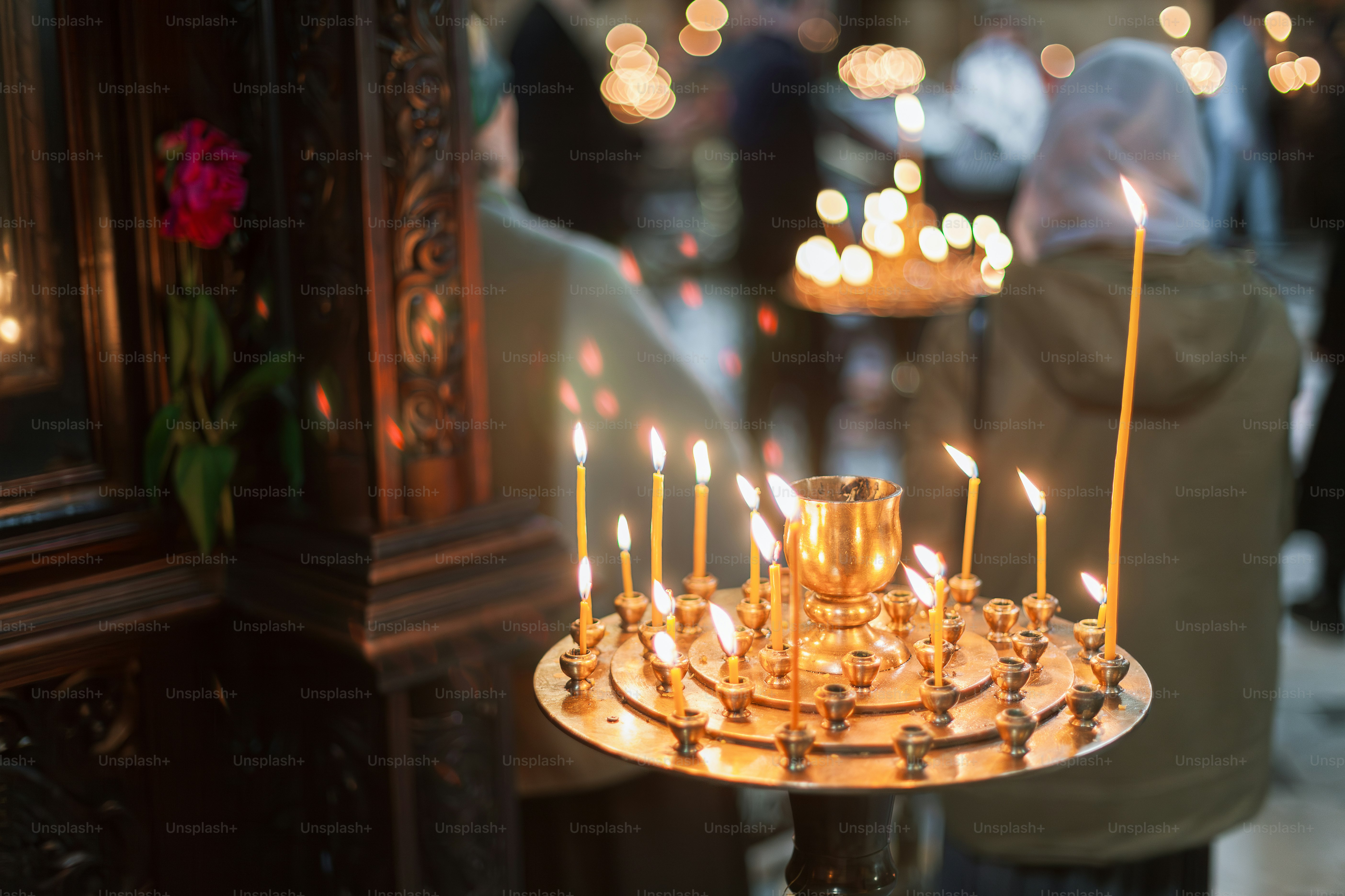 a cake with many lit candles on it