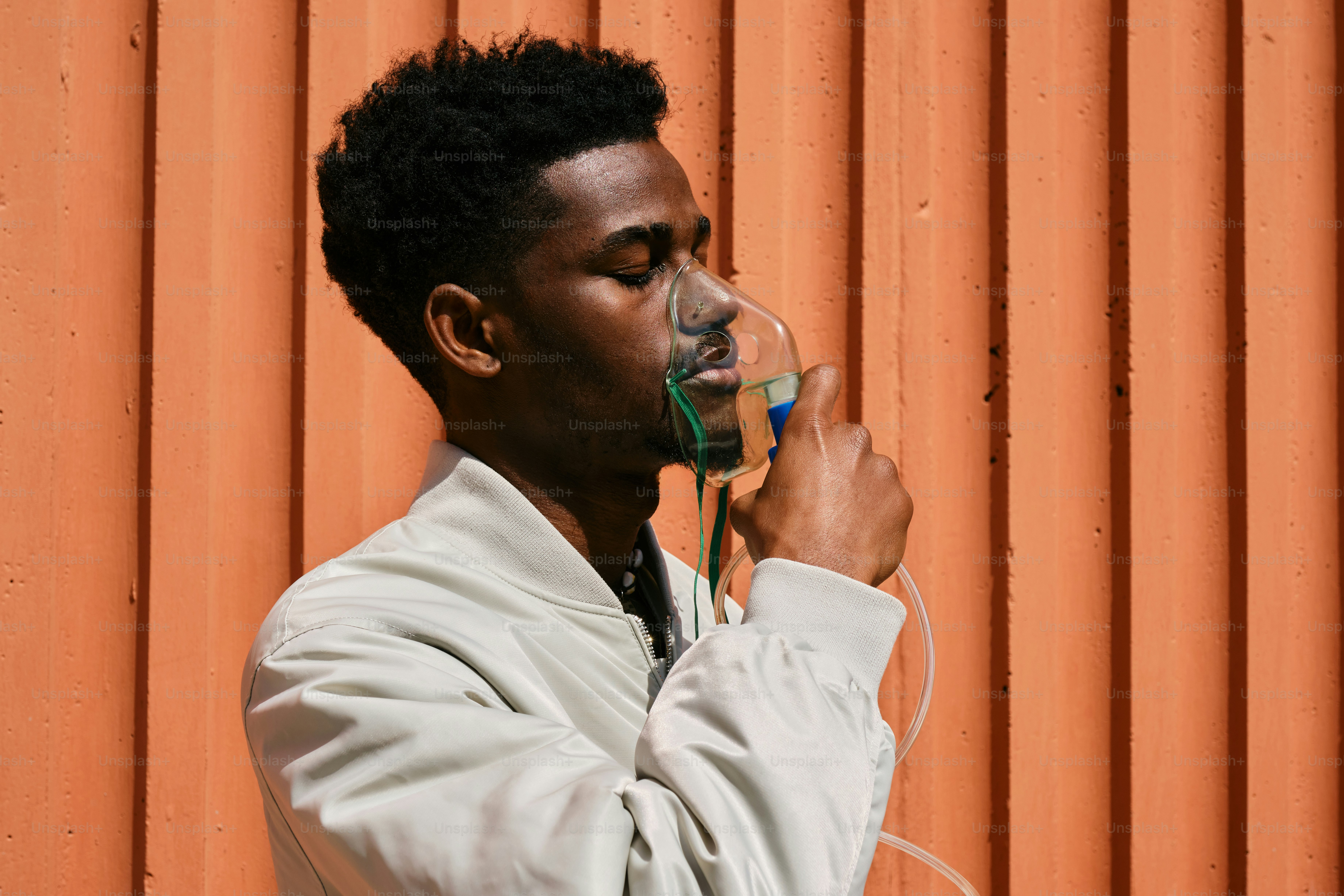 a man with a cigarette in his mouth