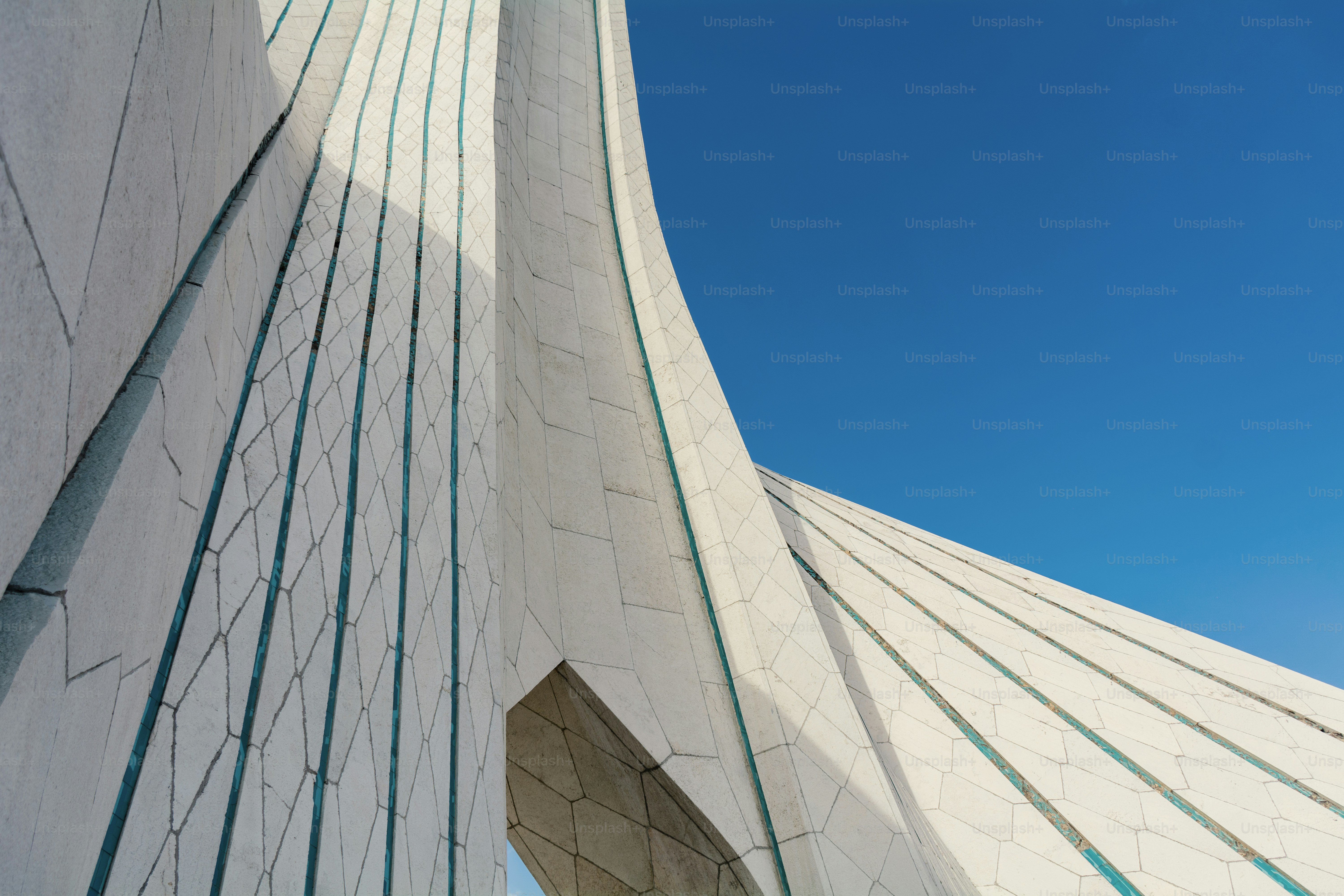 a white building with a blue sky in the background