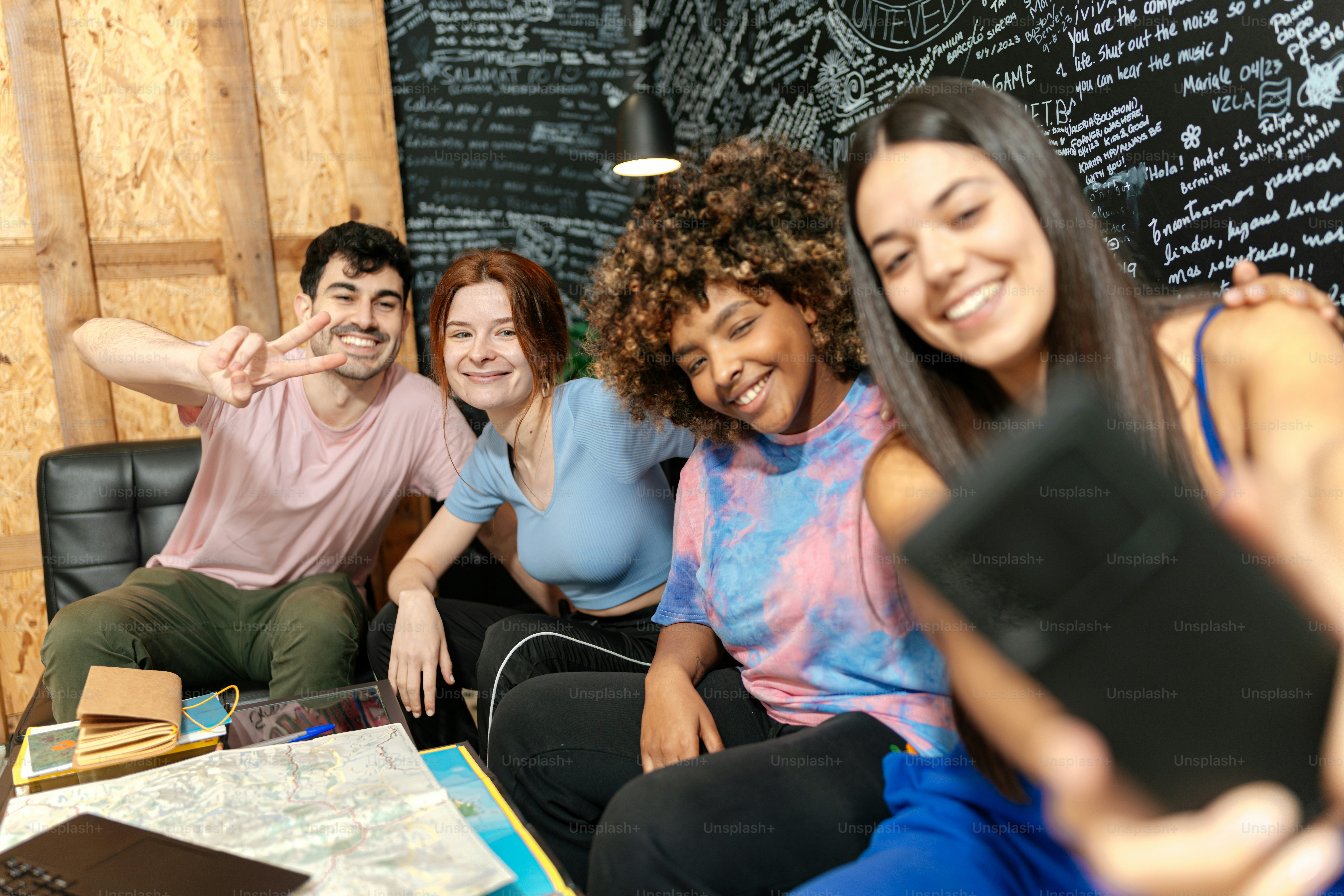 a group of people sitting around a table