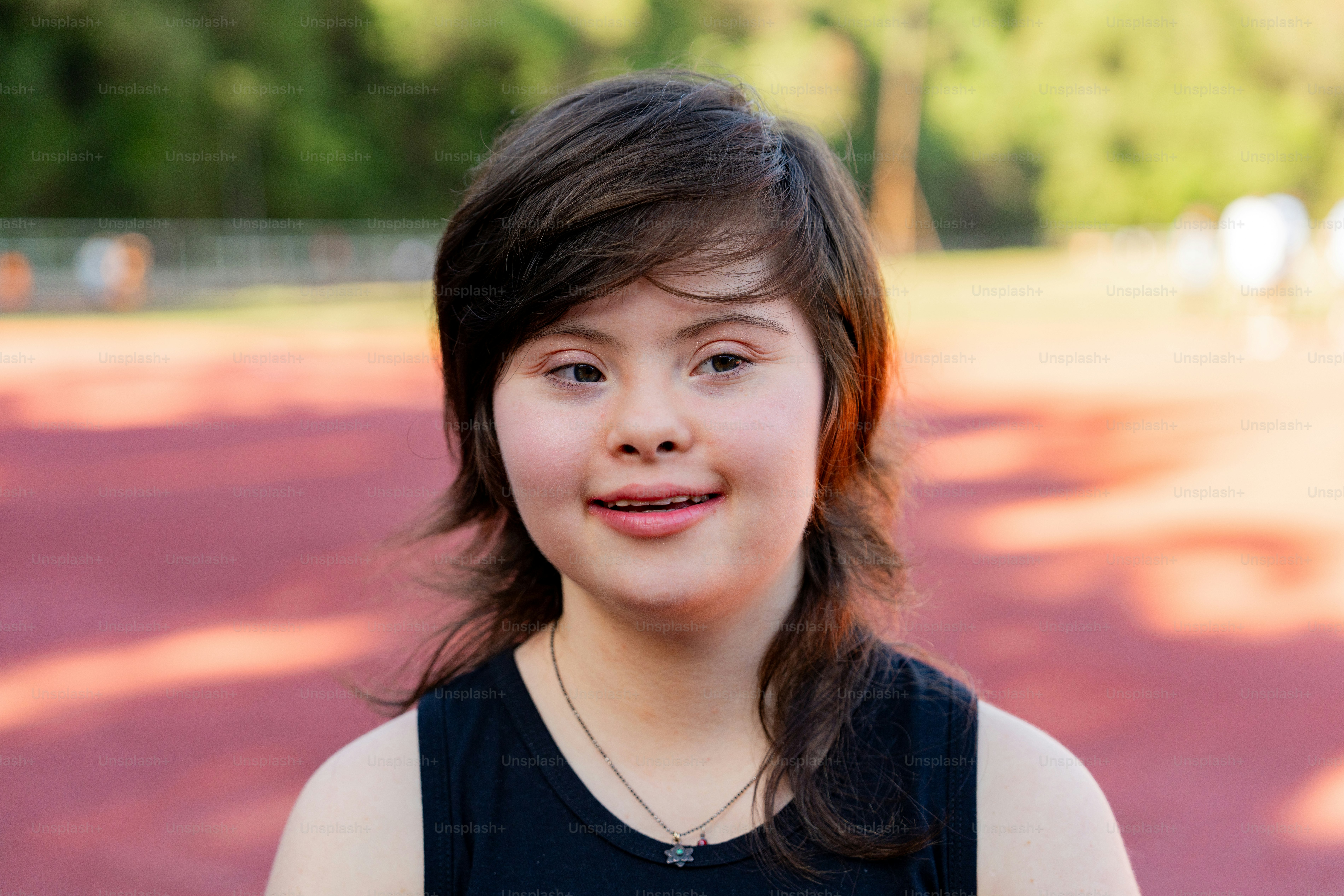 a young girl is posing for a picture