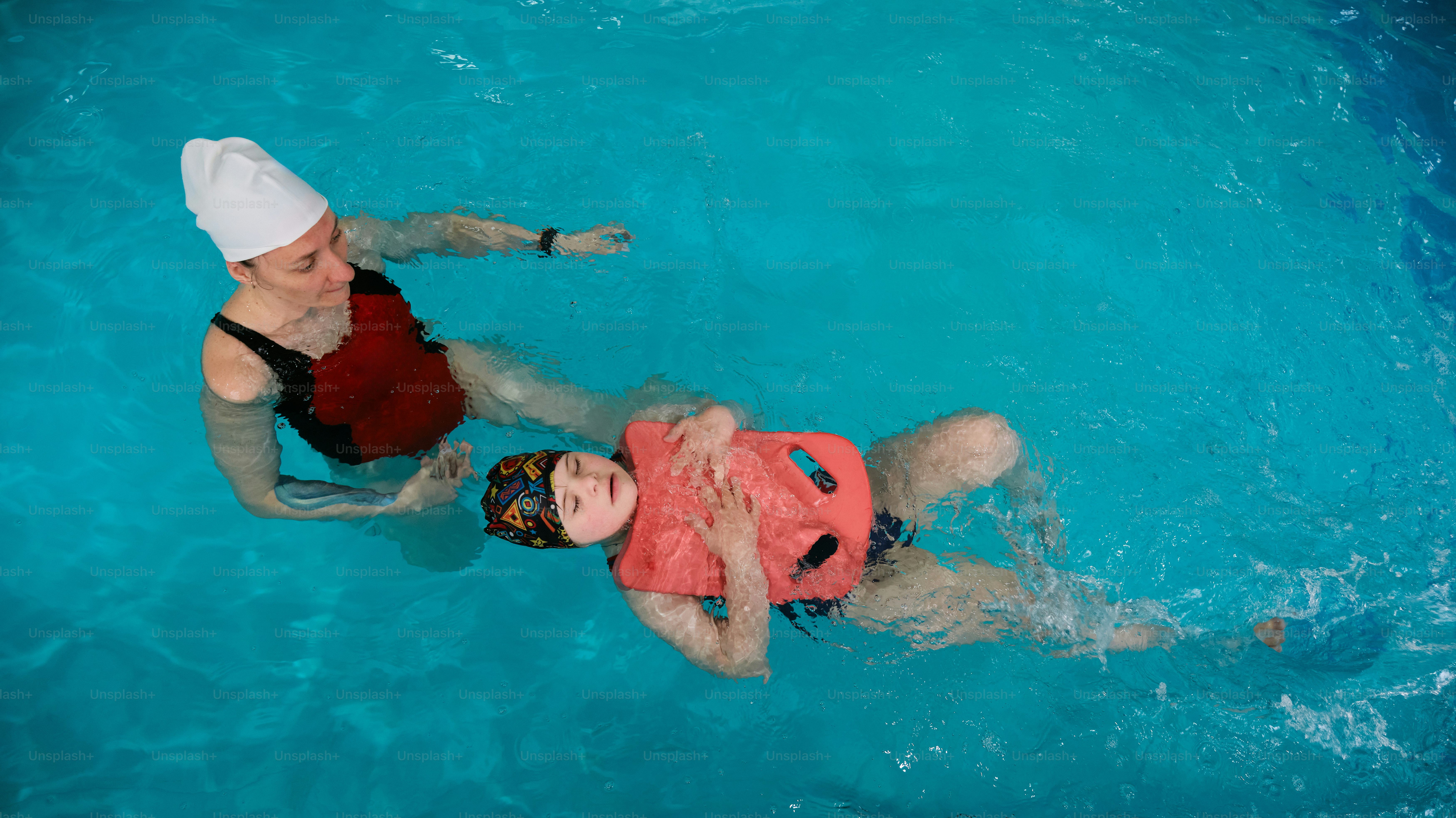 a child with Down's syndrome at the swimming pool